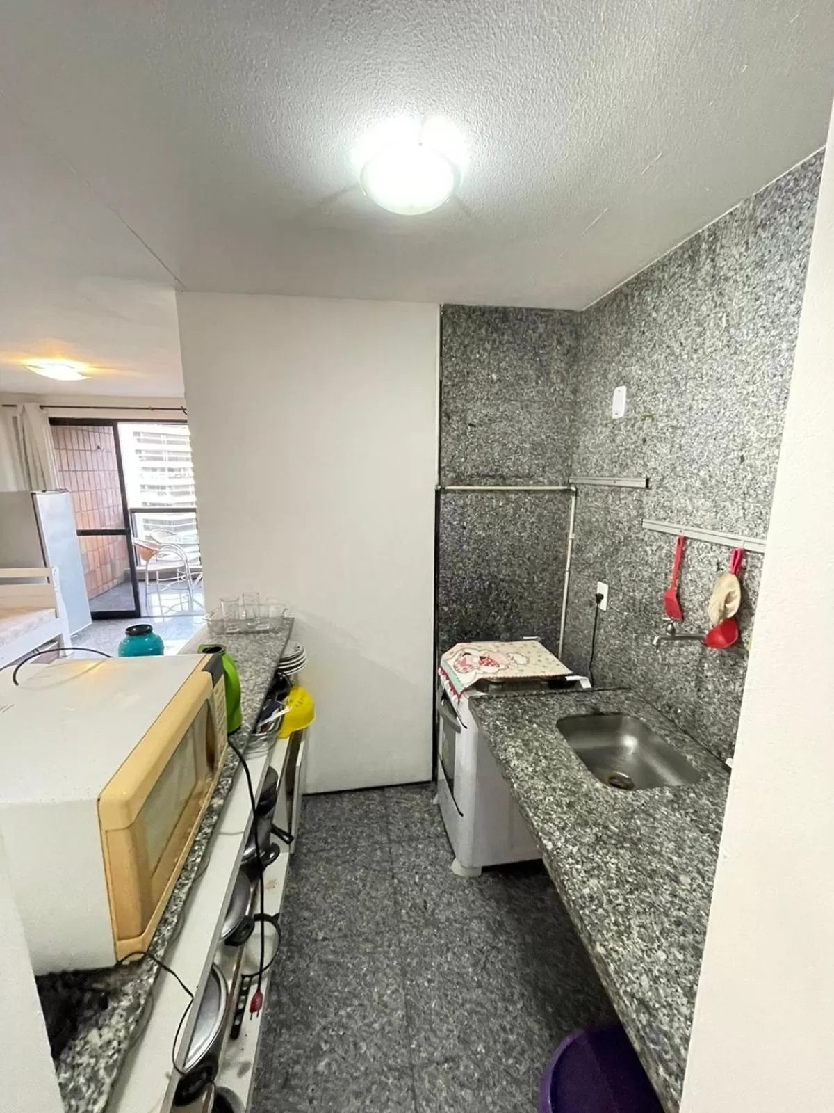 Kitchen/Kitchenette in Flat Atlântico Neto