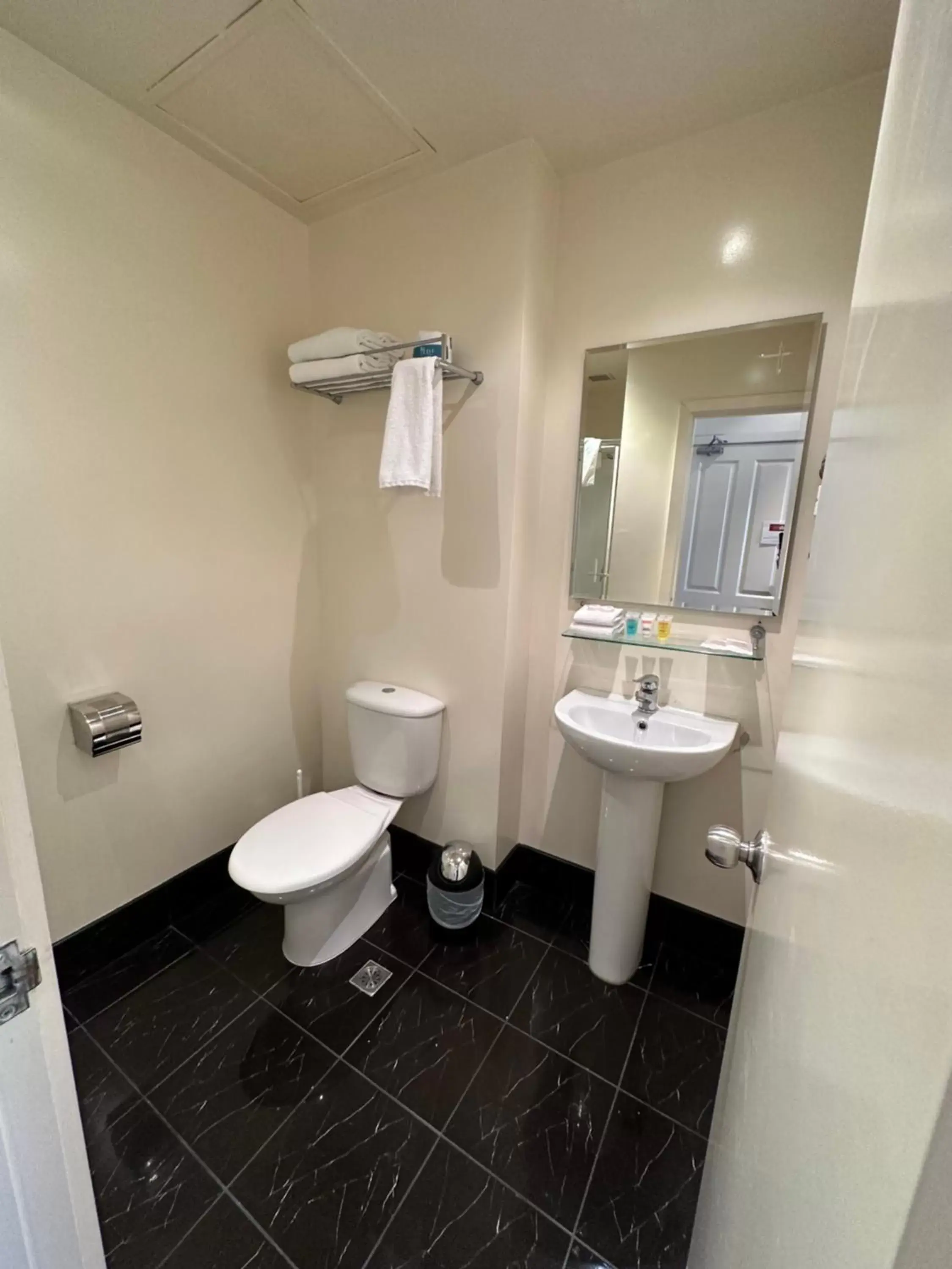 Toilet, Bathroom in Trinity Hotel