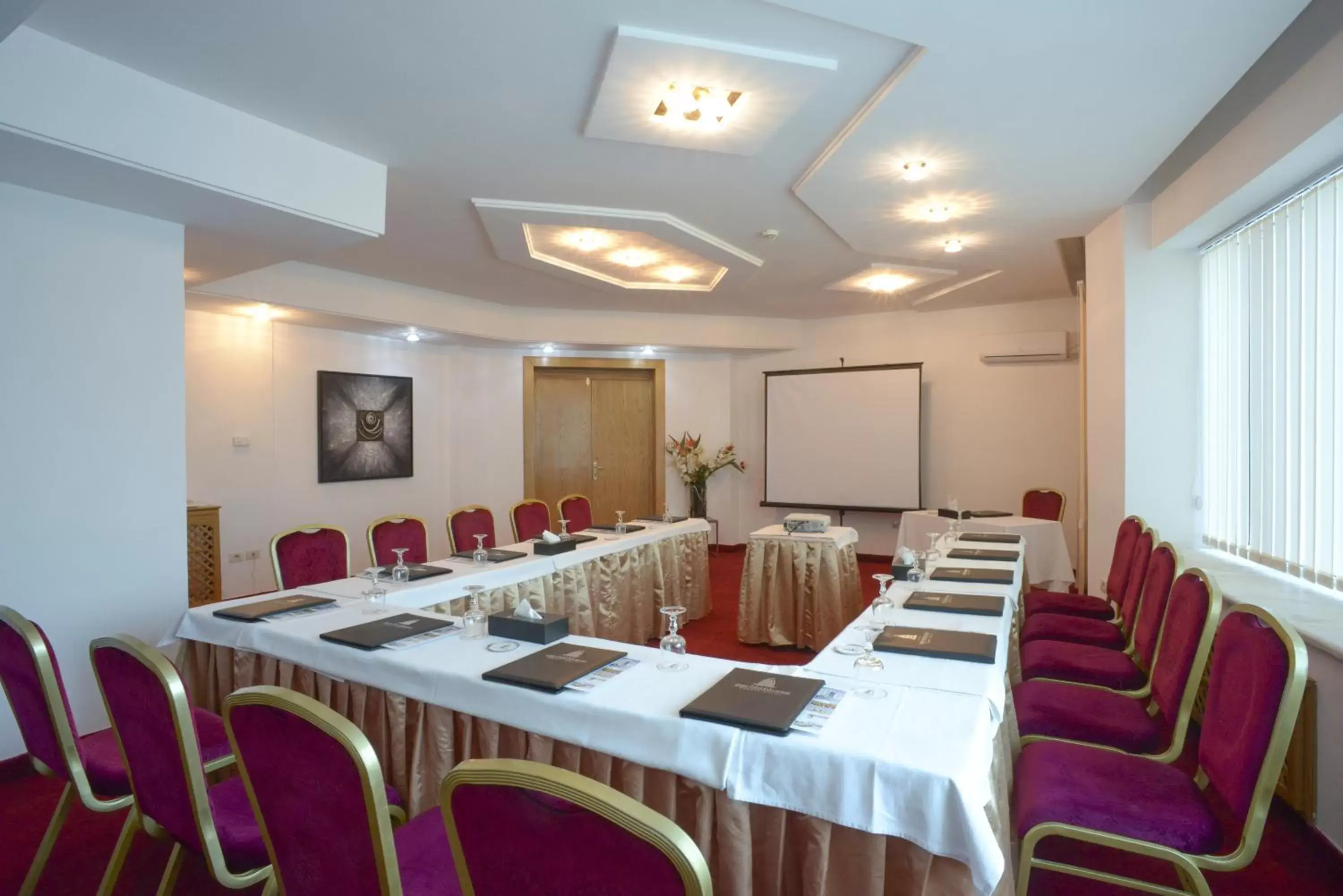 Meeting/conference room in The Penthouse Suites Hotel