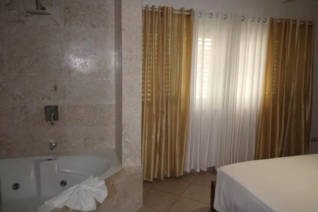 Shower, Bed in Albachiara Hotel - Las Terrenas