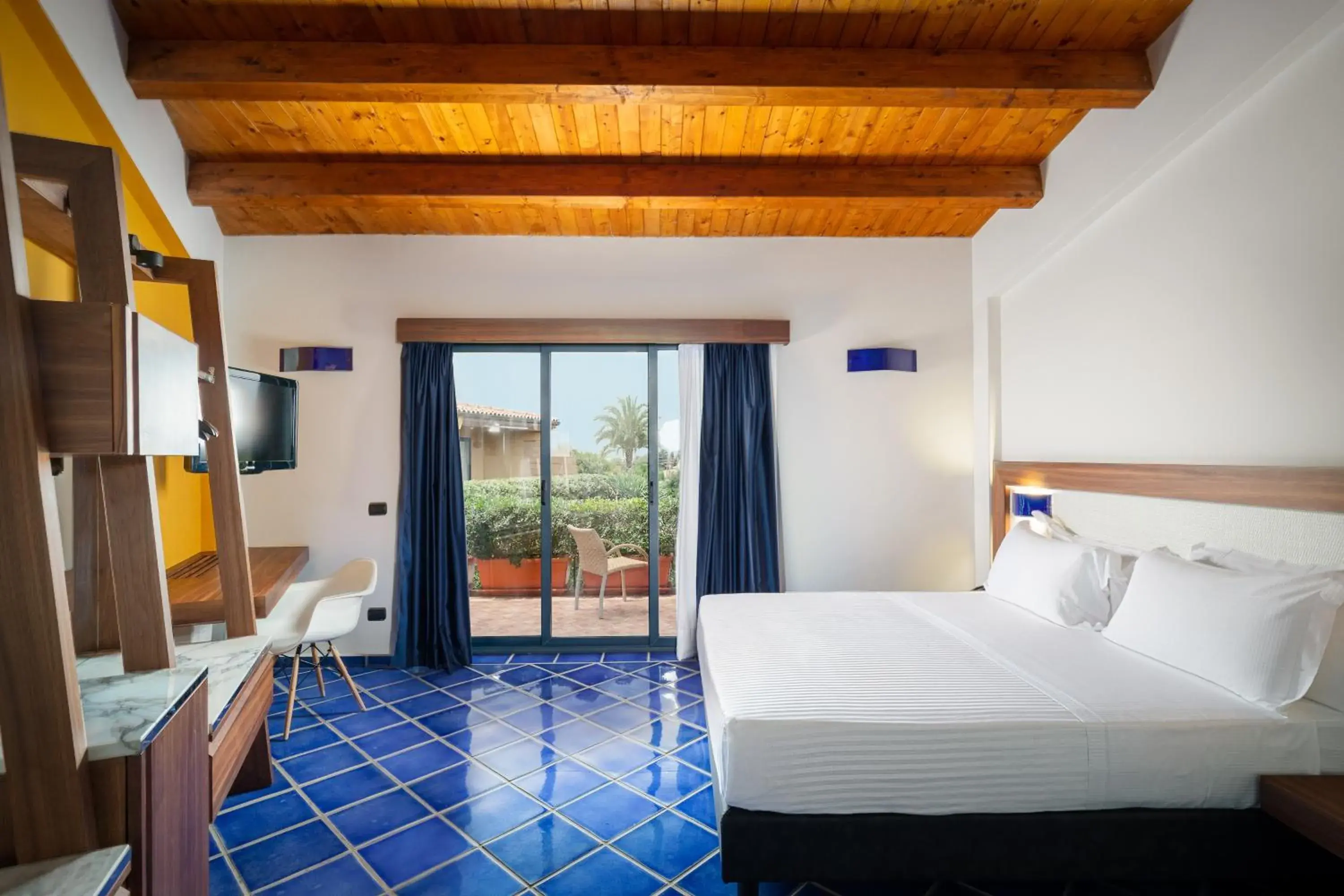 Bed in Magaggiari Hotel Resort