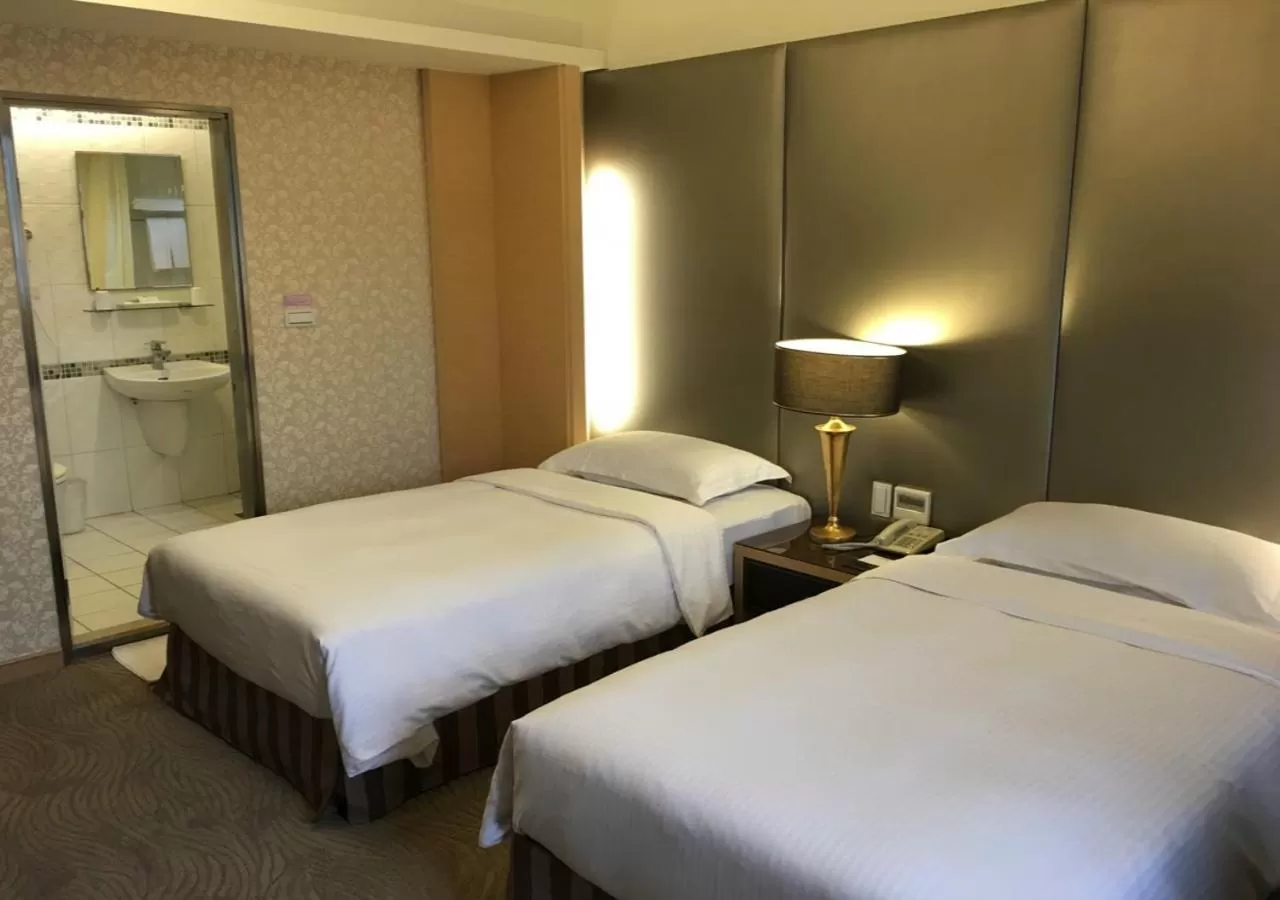 Bed in The Metro Hotel - Taipei Branch