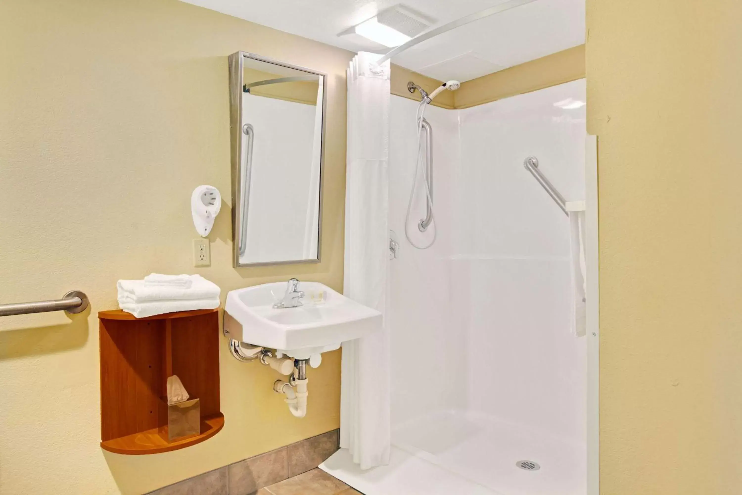 Bathroom in Days Inn by Wyndham East Windsor/Hightstown