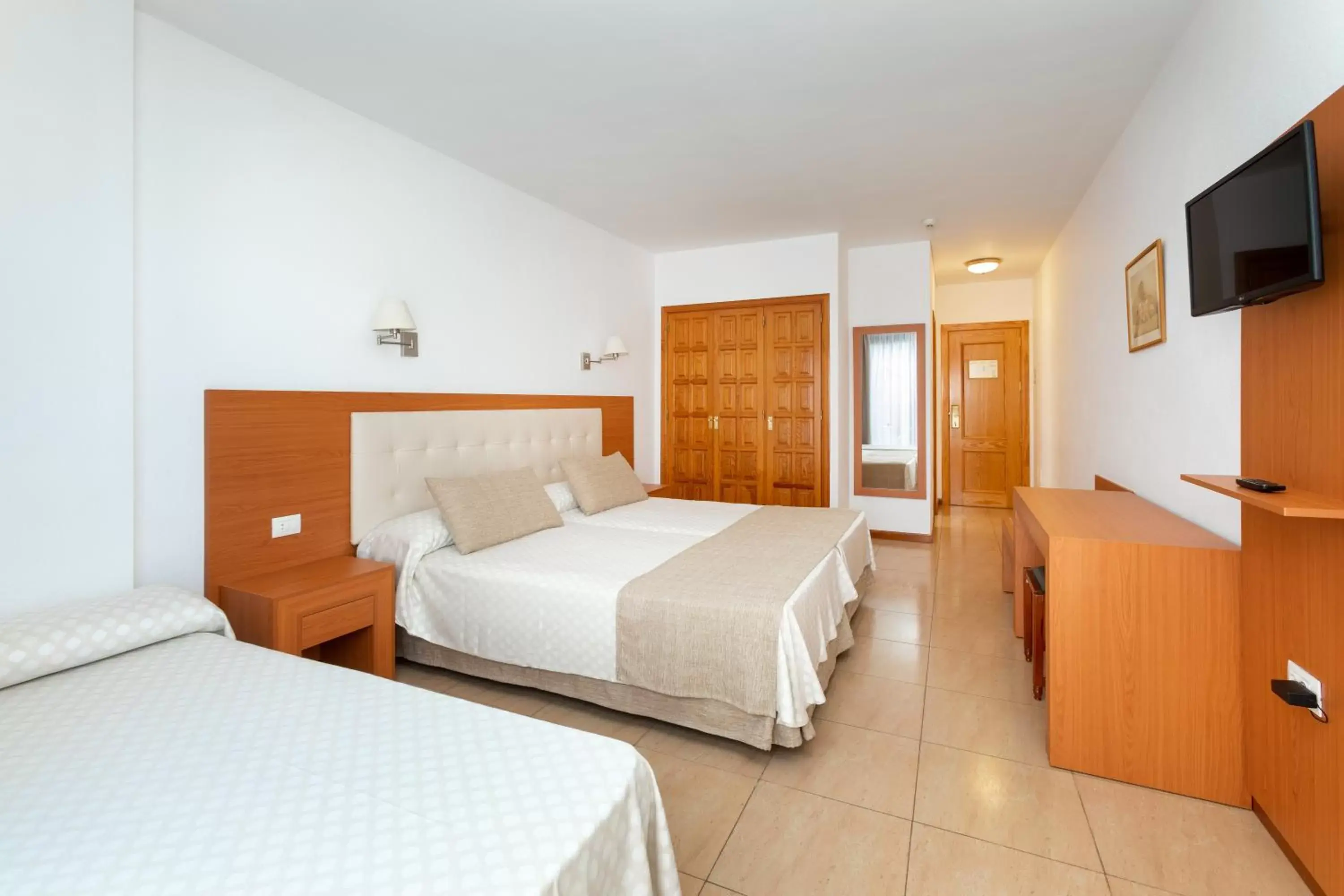 Bed in Hotel Don Manolito