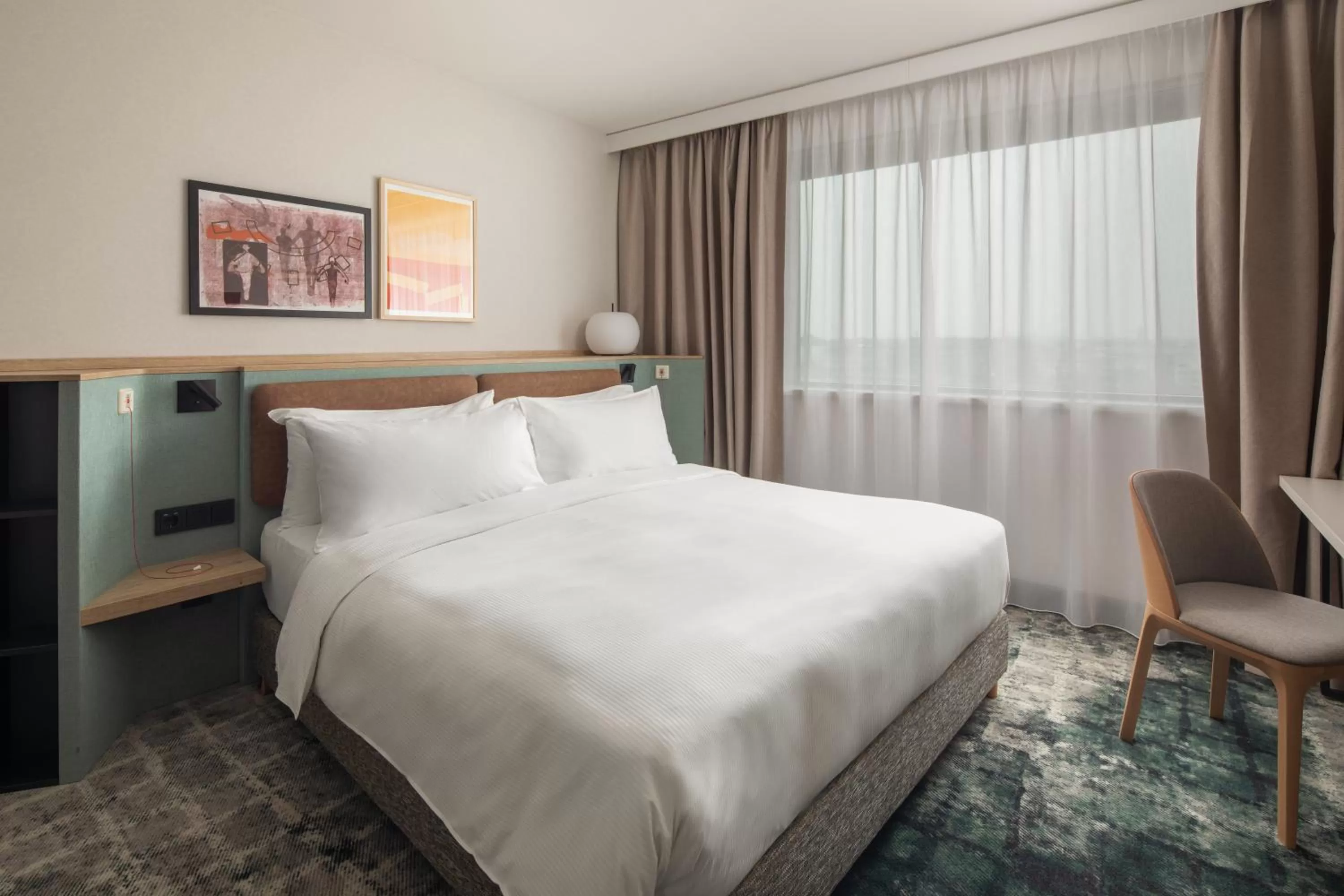 Photo of the whole room, Bed in Crowne Plaza Budapest by IHG