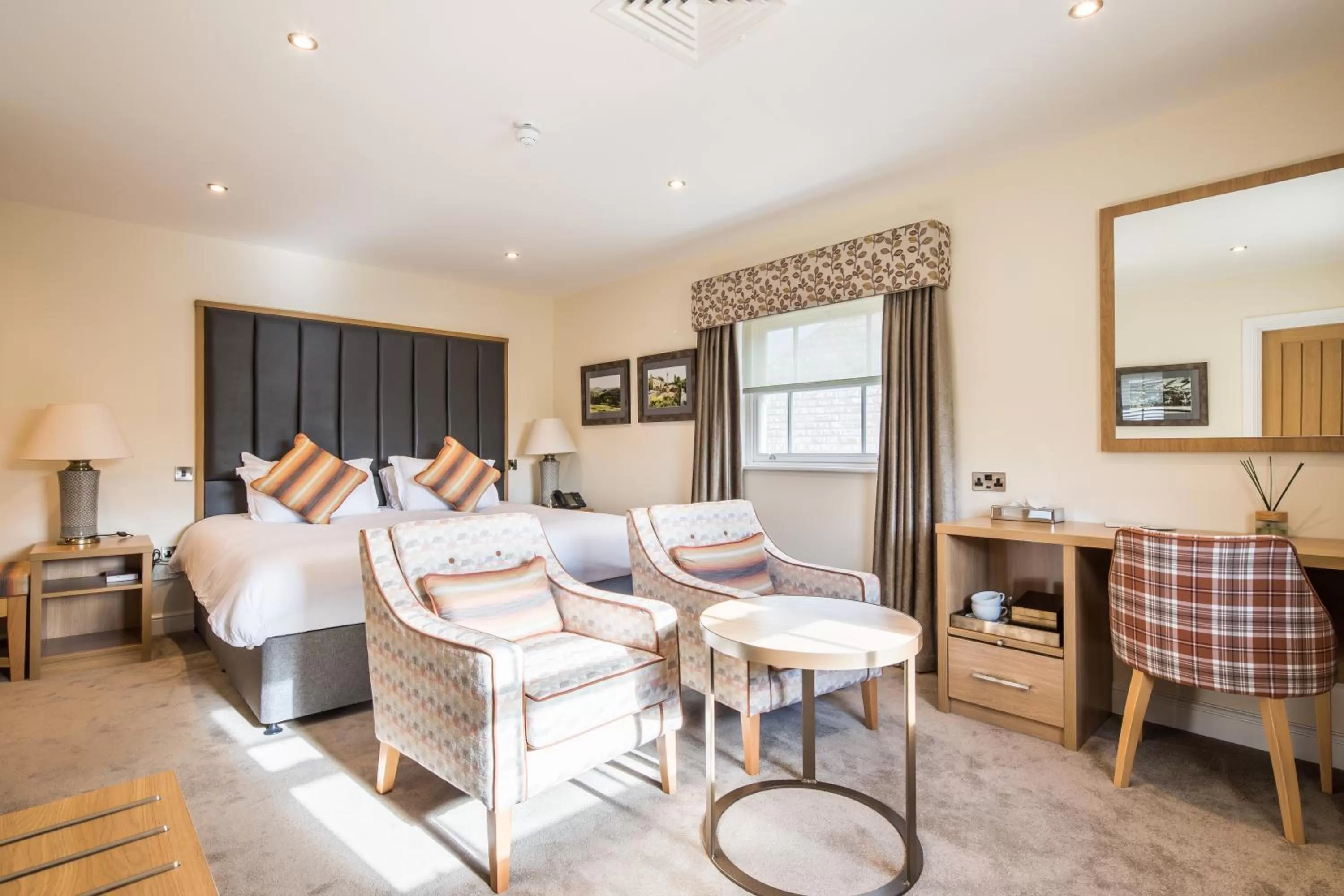 Bed in The H Boutique Hotel