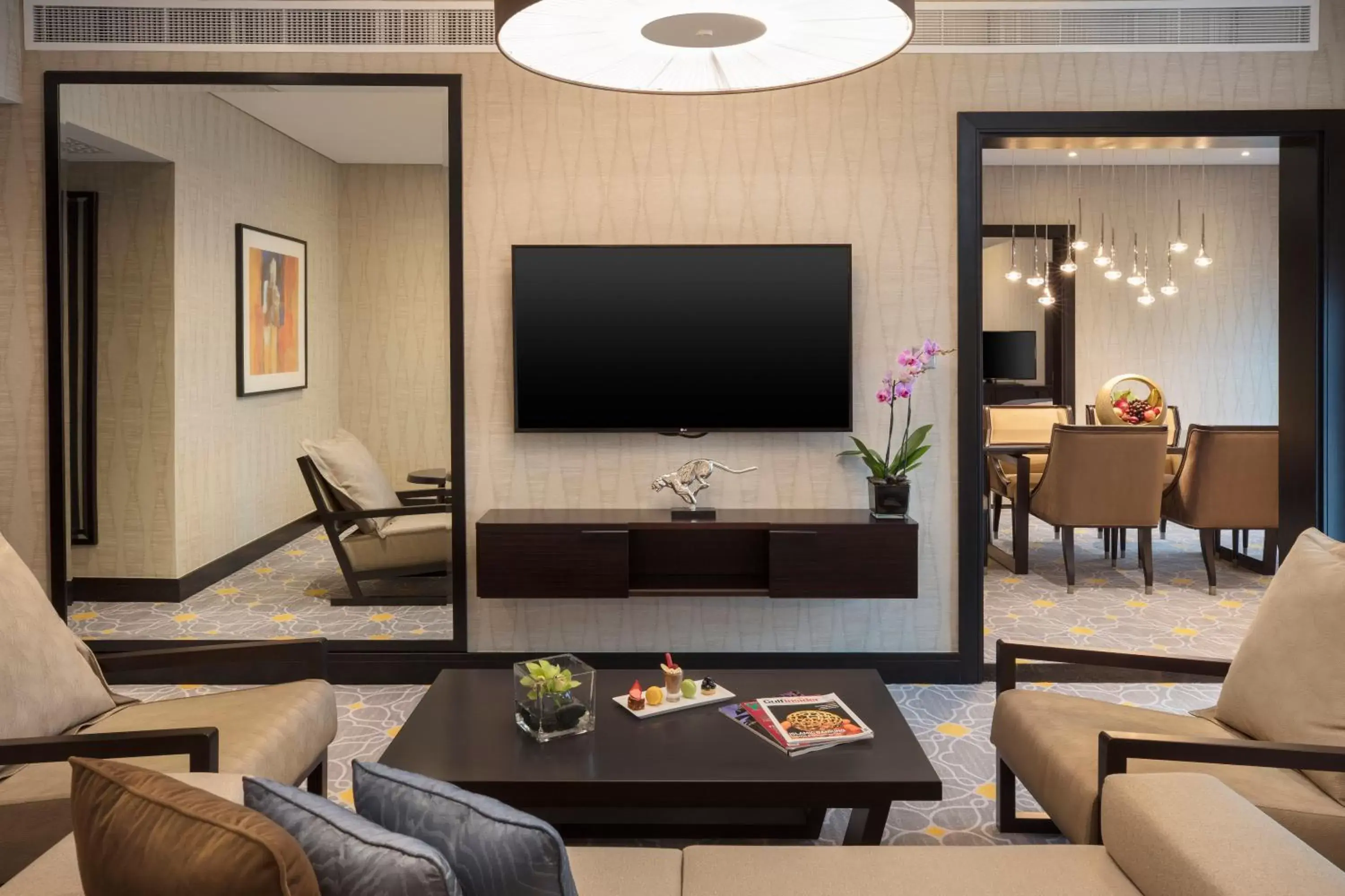 Photo of the whole room, TV/Entertainment Center in Crowne Plaza Bahrain, an IHG Hotel