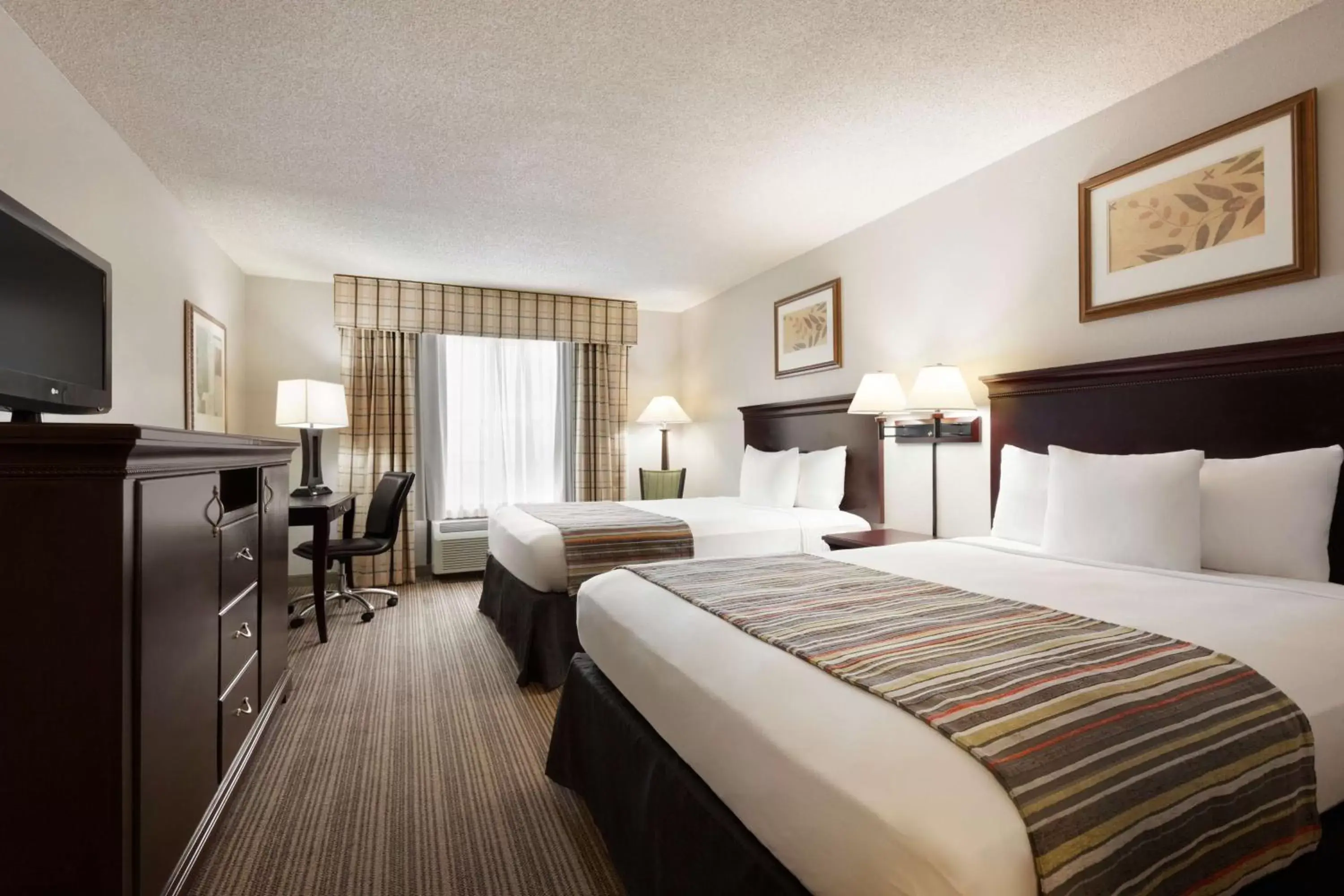 Photo of the whole room in Country Inn & Suites by Radisson, Kingsland, GA