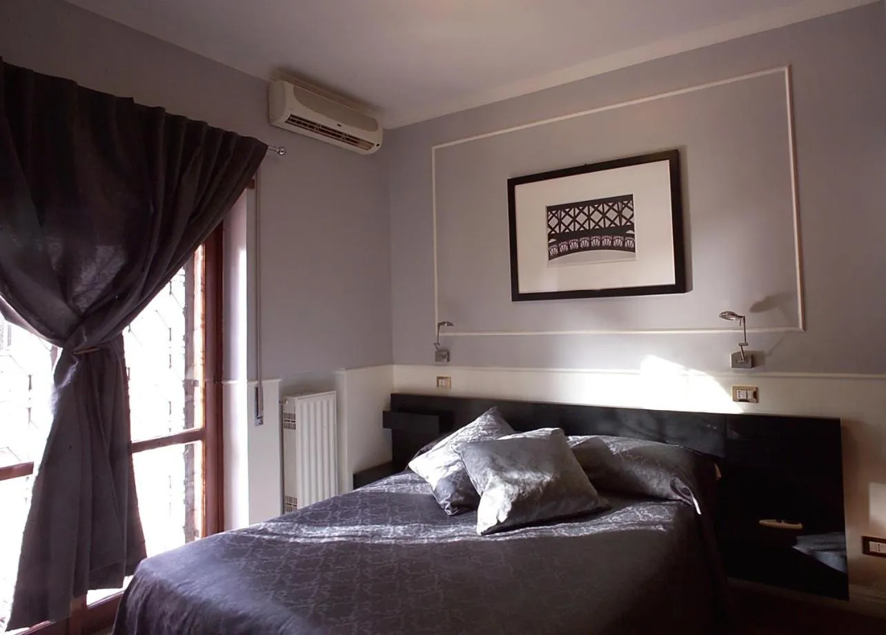 Bed in Hotel Residence Magnolia