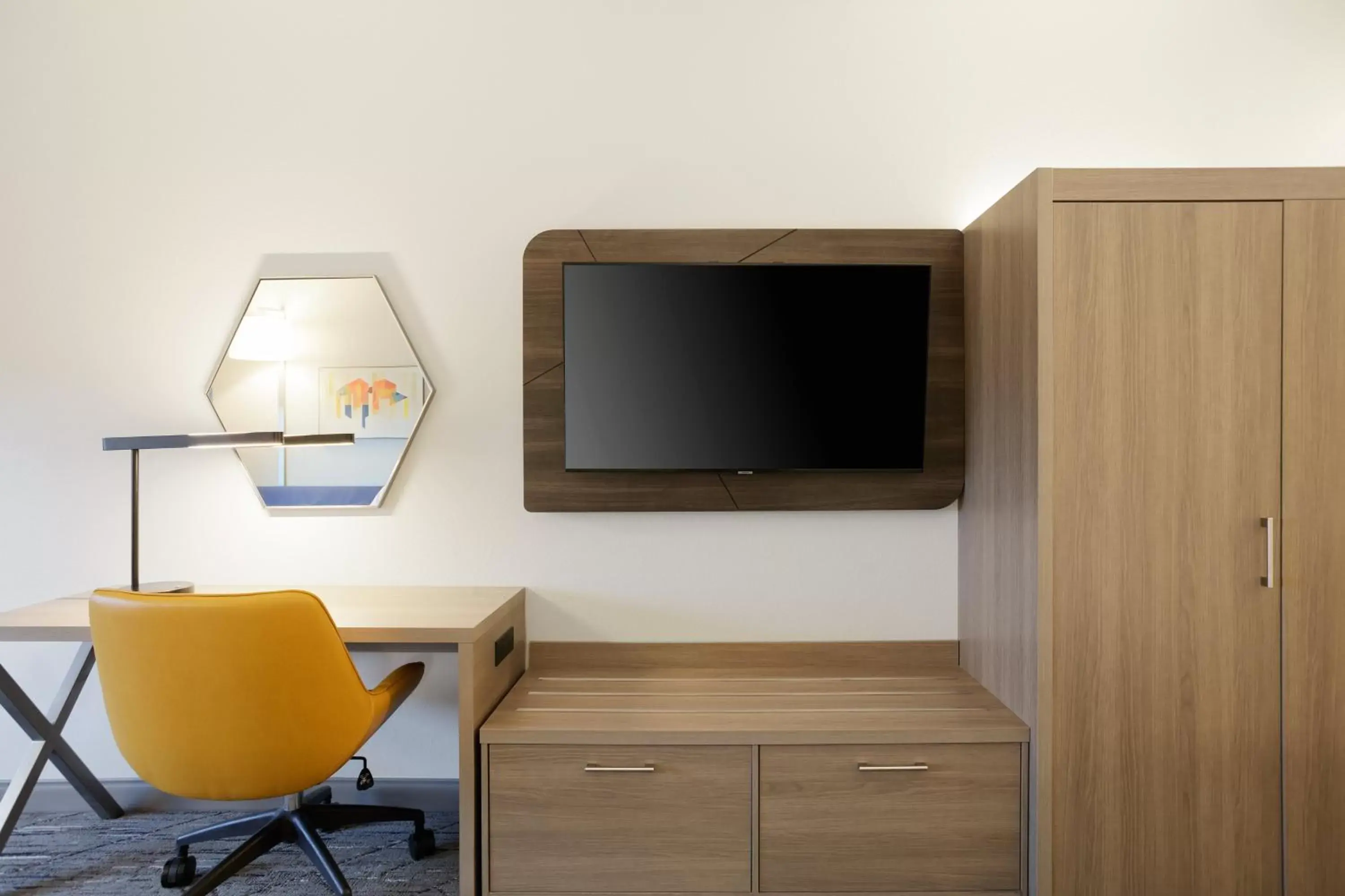 Photo of the whole room, TV/Entertainment Center in Holiday Inn Express Hotel & Suites Grove City, an IHG Hotel