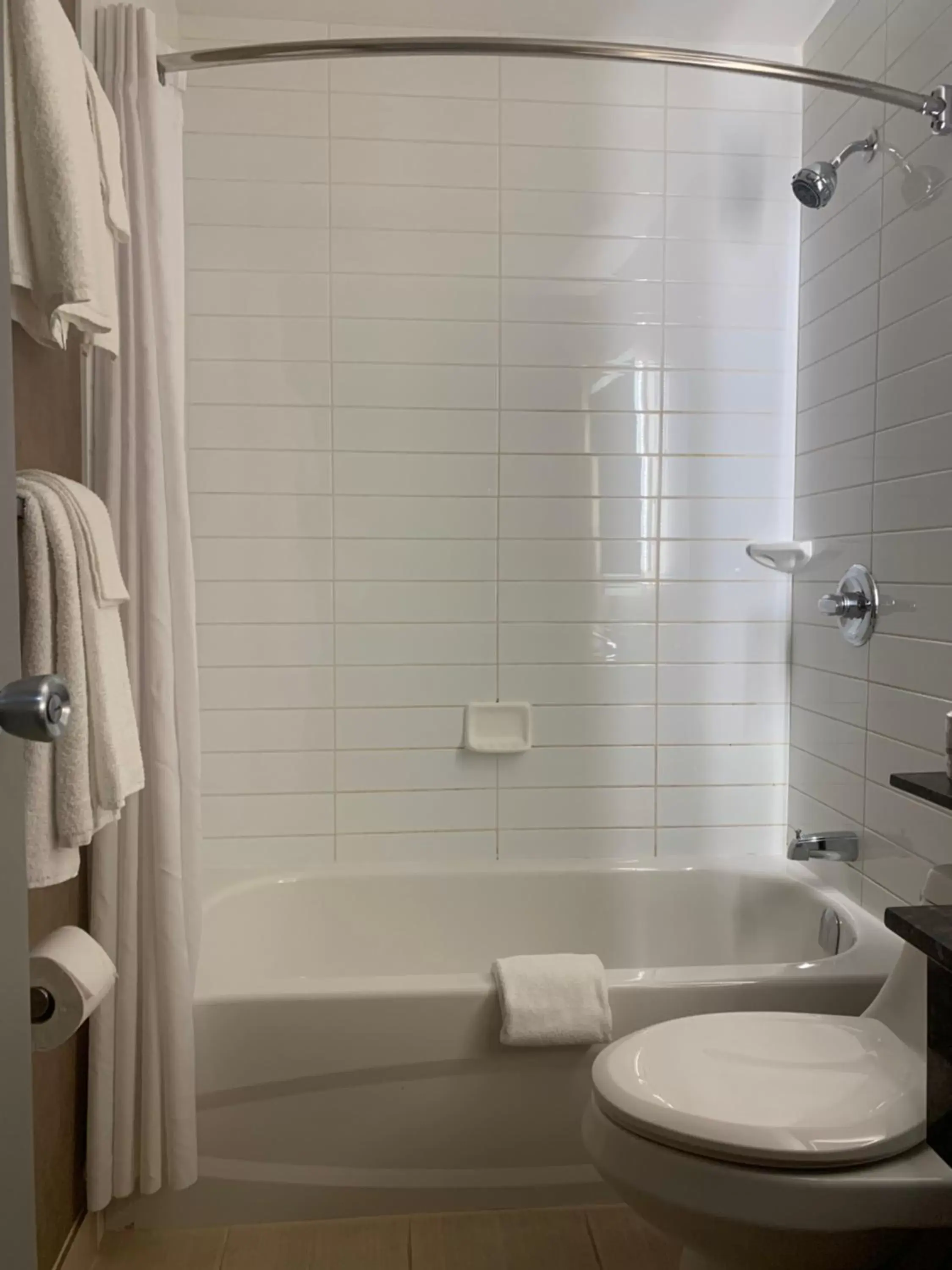 Bathroom in Howard Johnson by Wyndham Winnipeg West