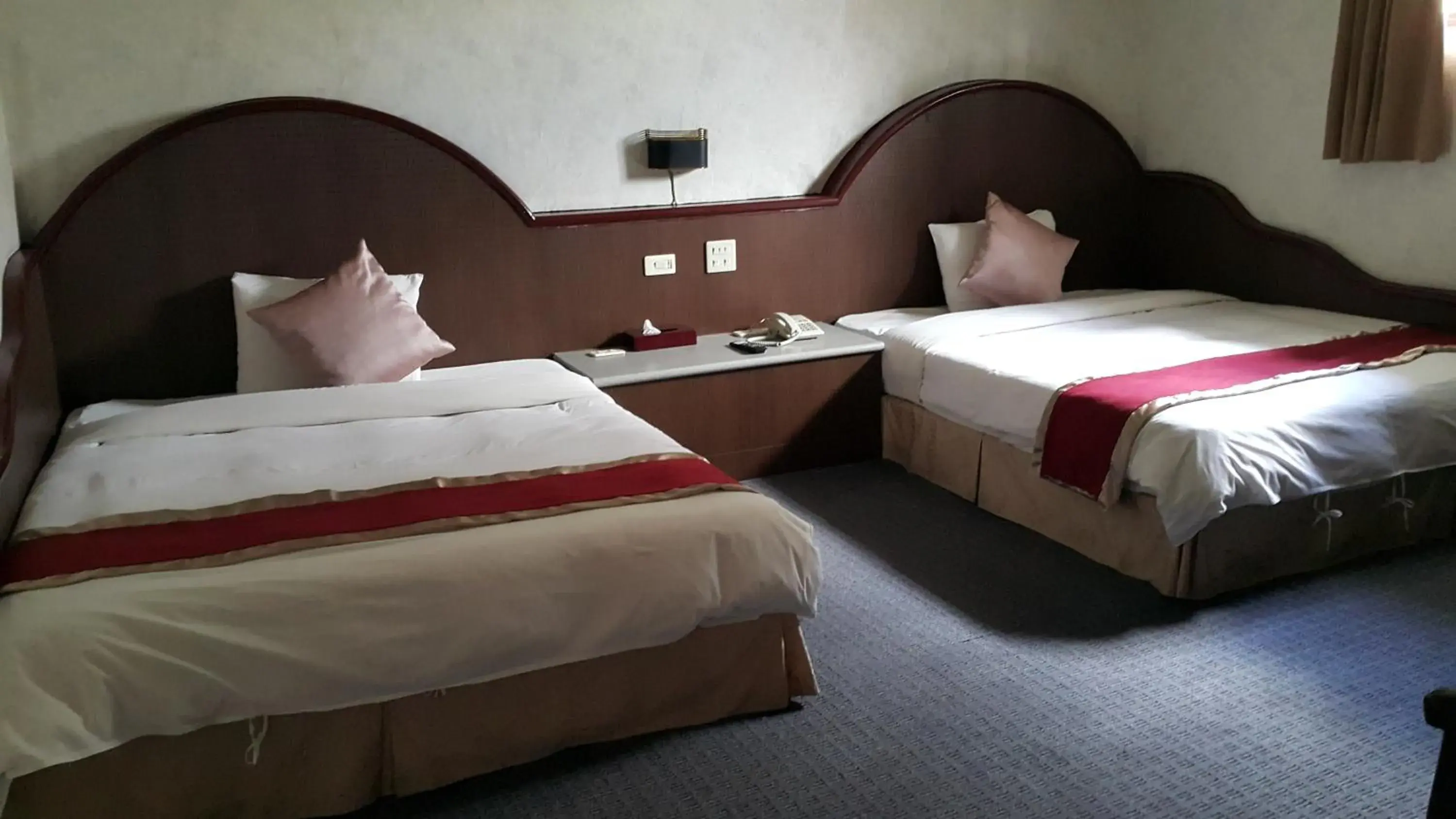 Photo of the whole room, Bed in Mei-Hua Hotel