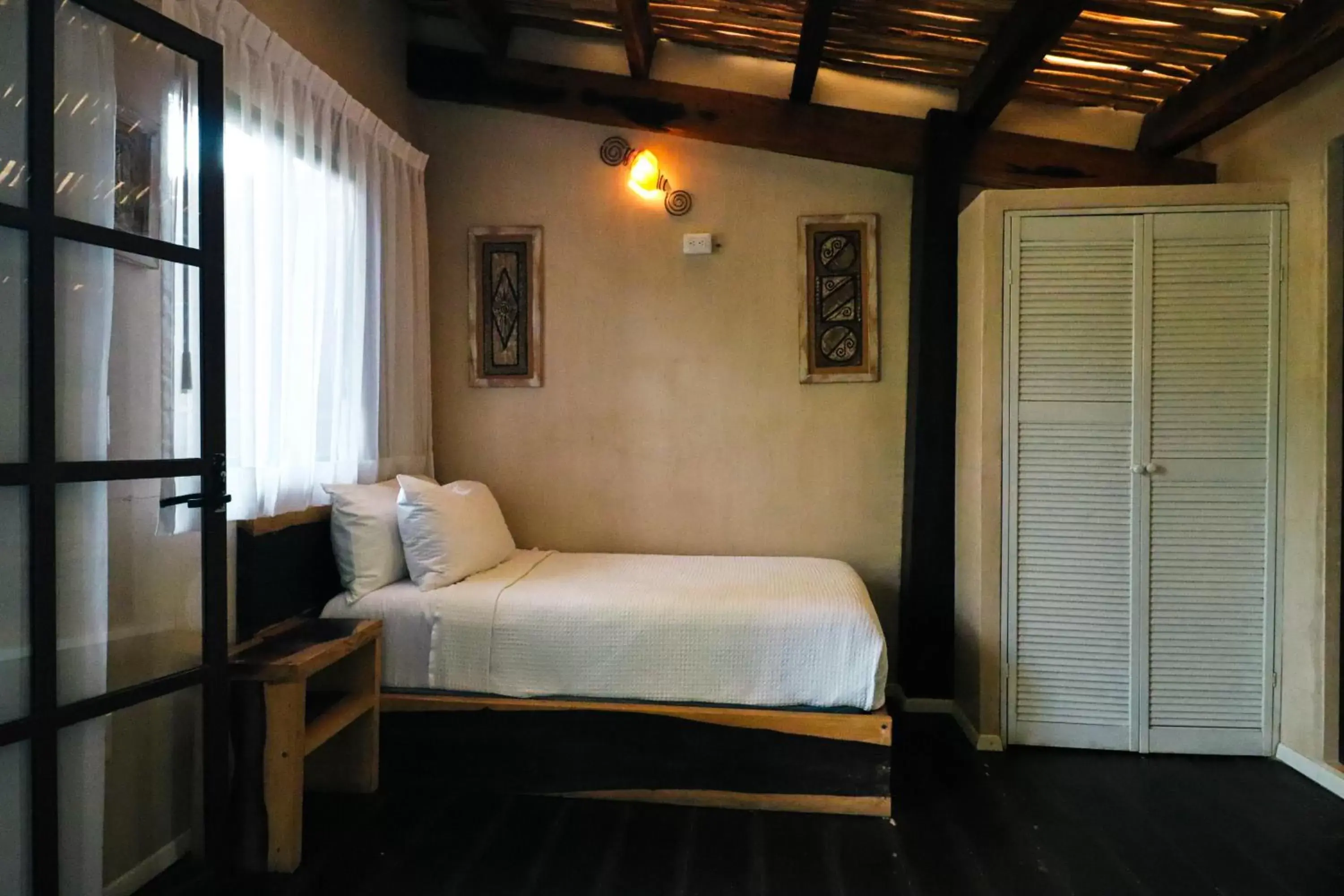 Bedroom, Bed in Villa Las Estrellas Tulum - located at the party zone