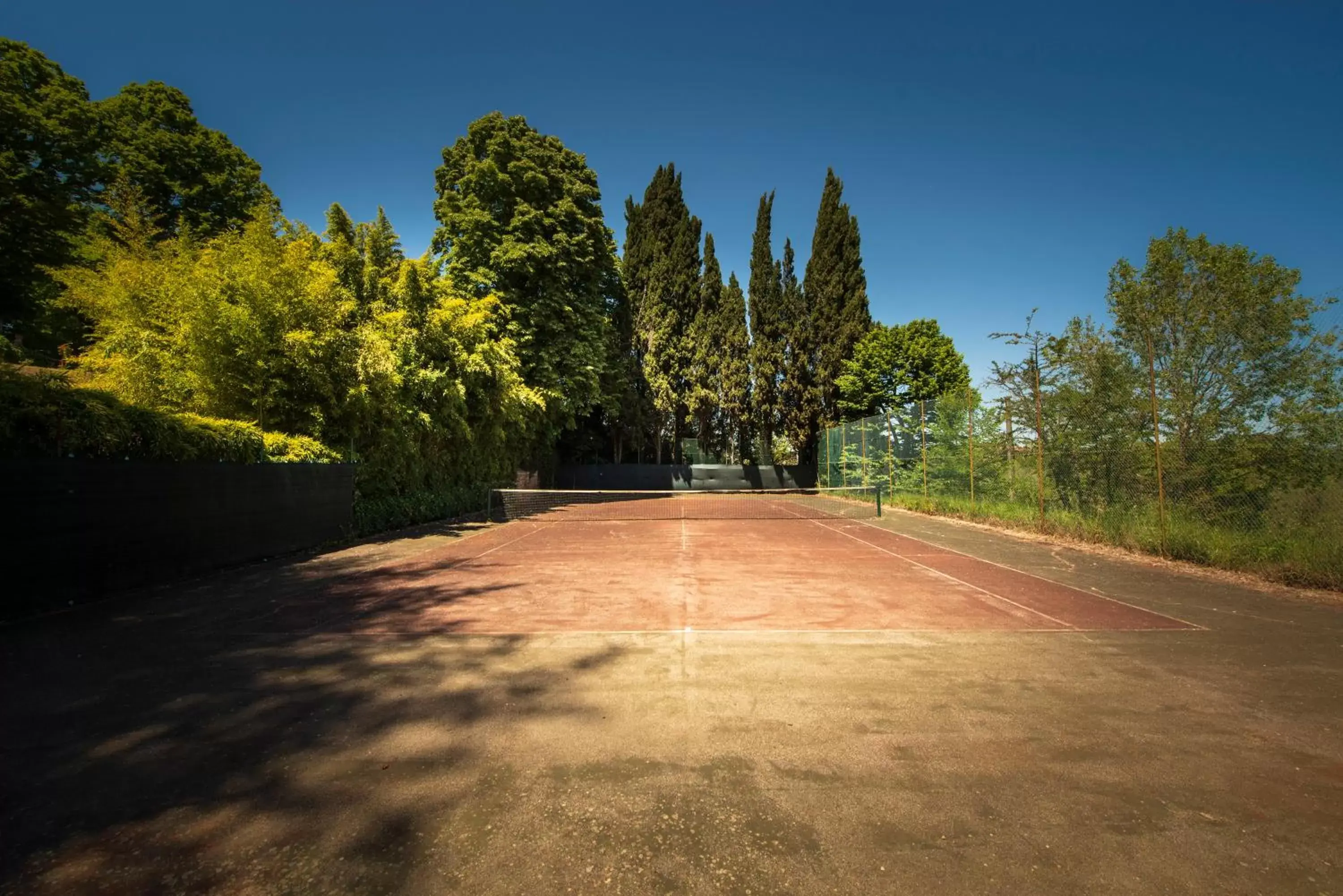 Tennis court in Villa Scacciapensieri Boutique Hotel