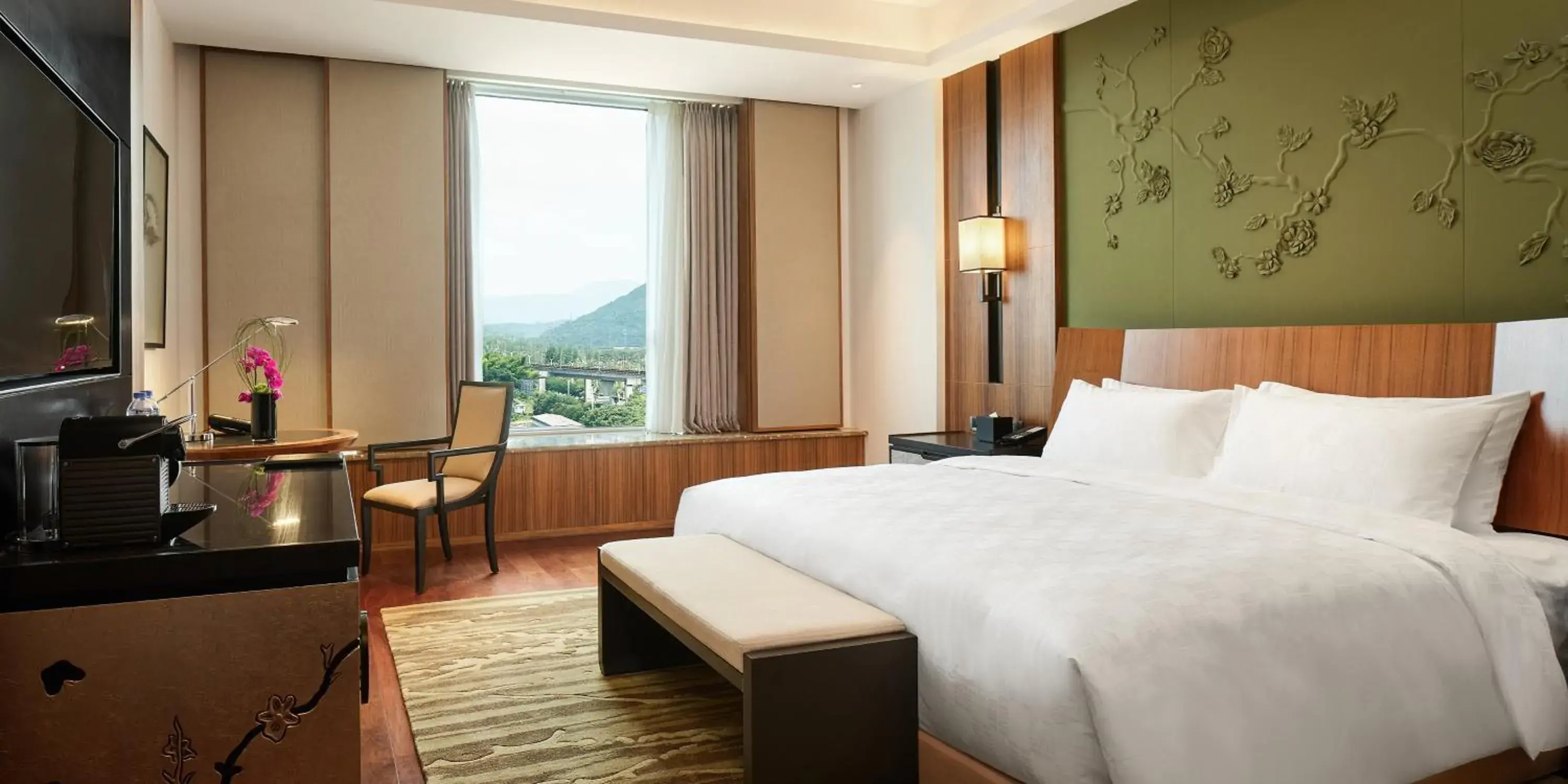 Photo of the whole room in HUALUXE Ningbo Harbor City, an IHG Hotel