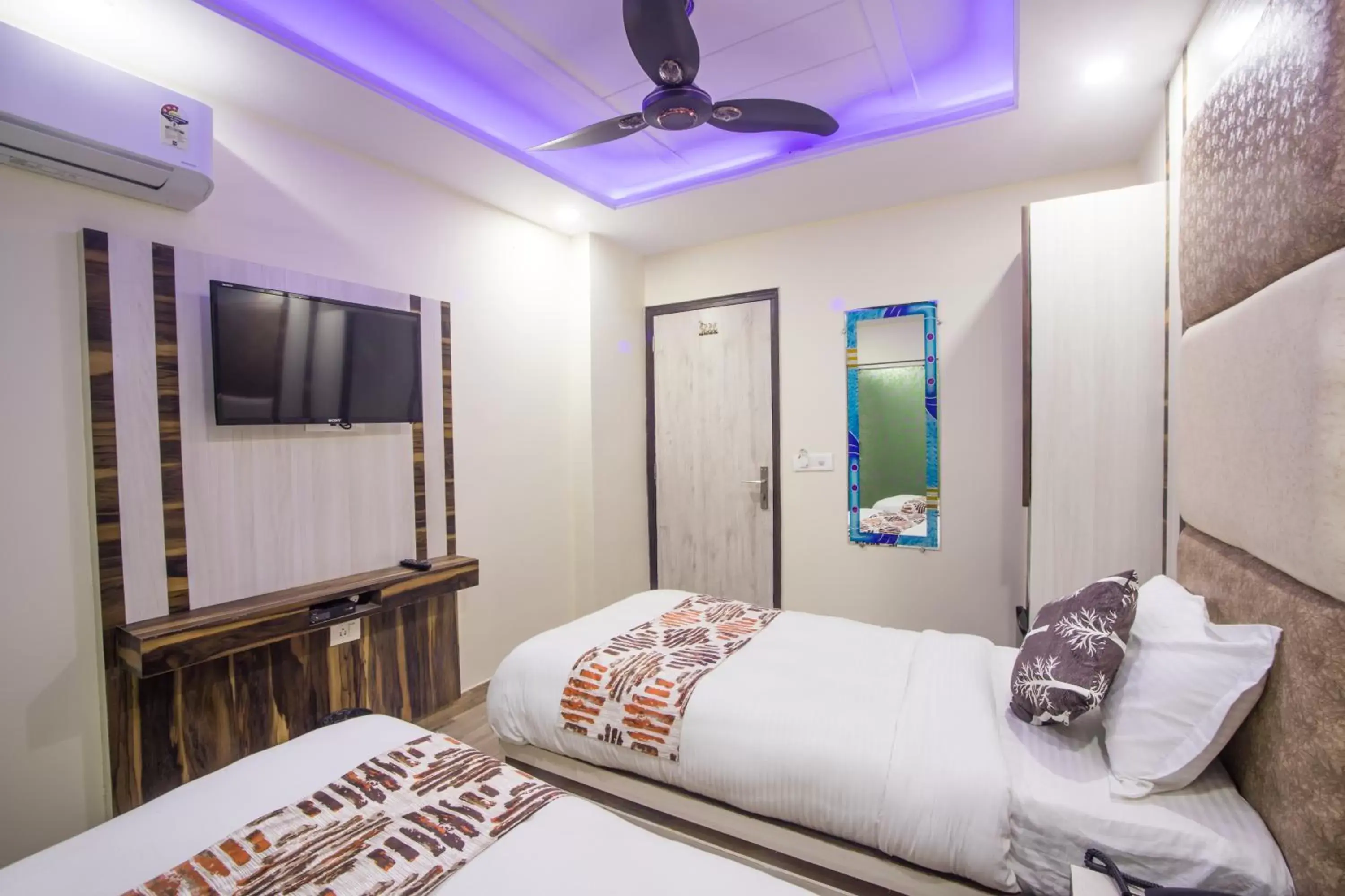 Bed in Hotel Harsha International