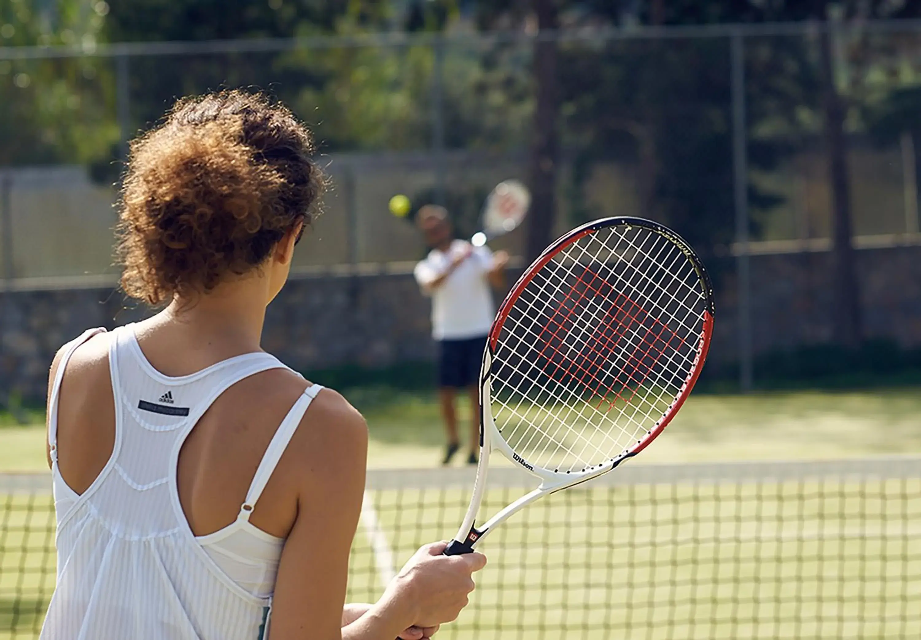 Tennis court in Pilot Beach Resort