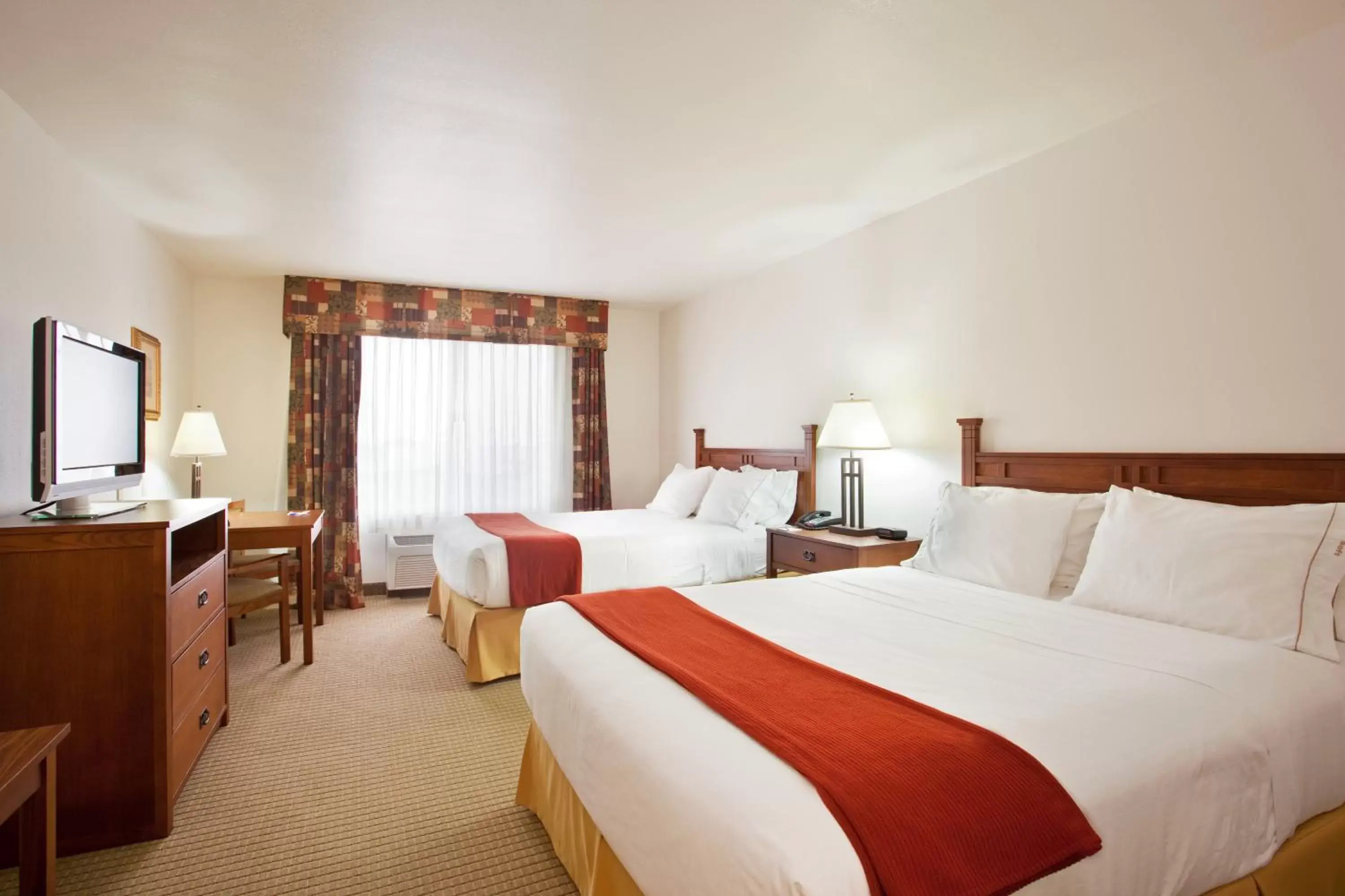 Bed in Holiday Inn Express Hotel & Suites Mattoon, an IHG Hotel