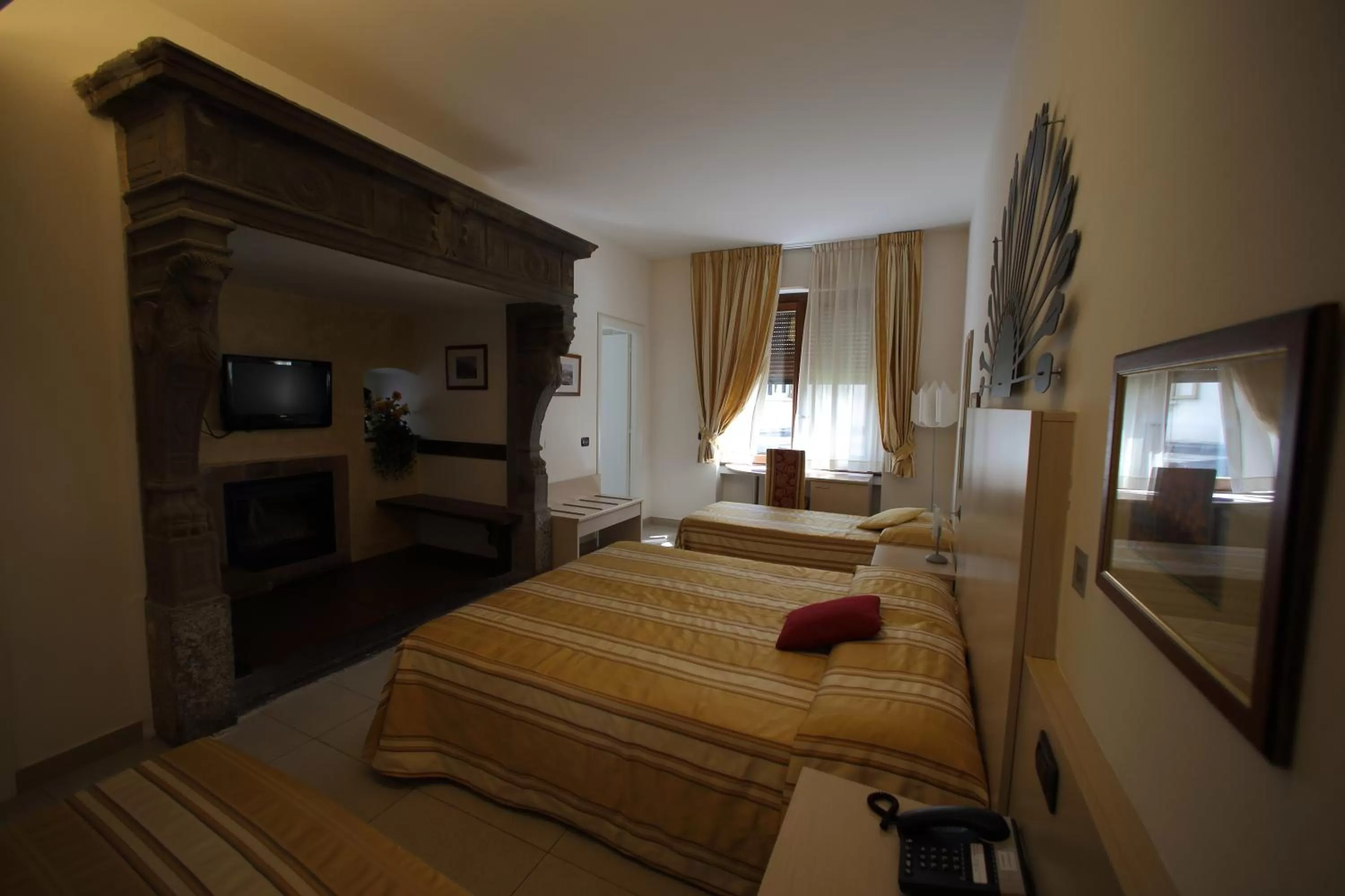 Photo of the whole room, Bed in Hotel Fioroni