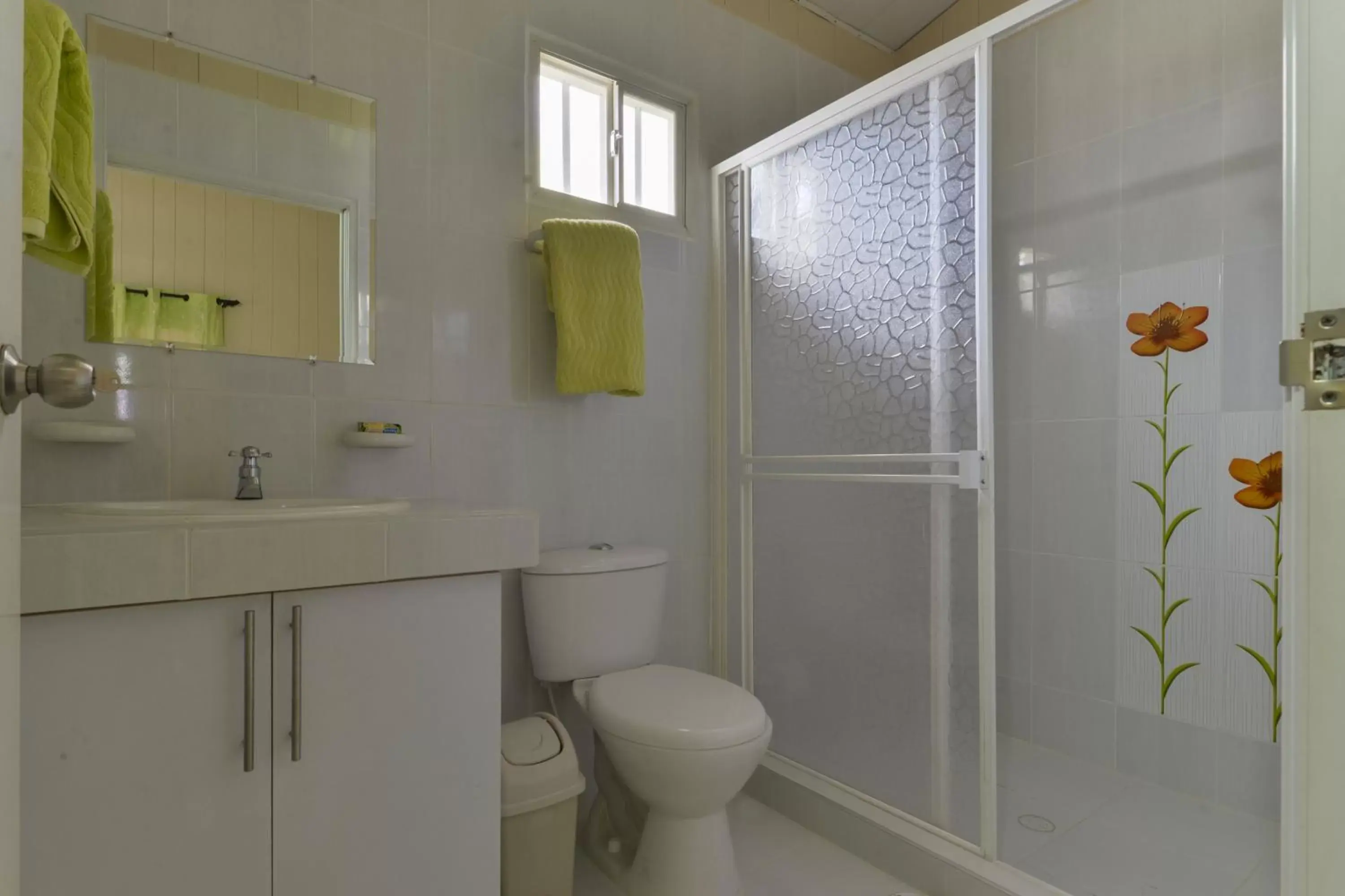 Bathroom in Tropical Coral Bathroom in Tropical Coral