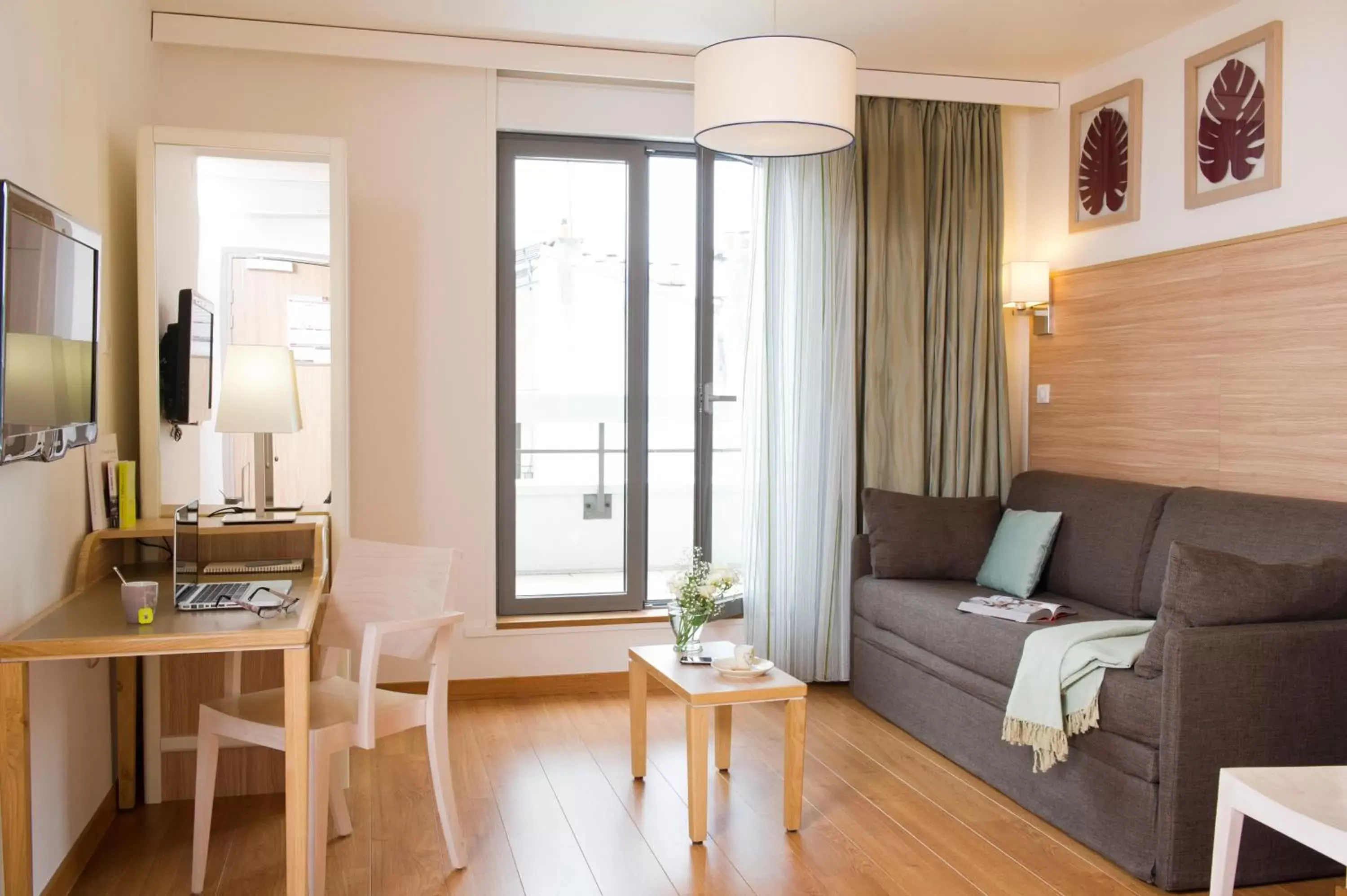 Living room in Aparthotel Adagio Paris Vincennes Living room in Aparthotel Adagio Paris Vincennes