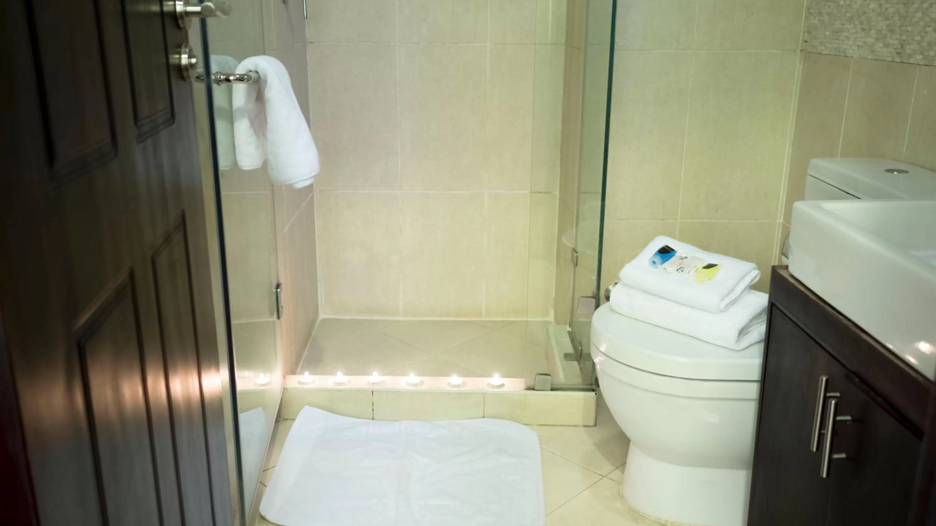 Bathroom in NewCity Hotel & Suites