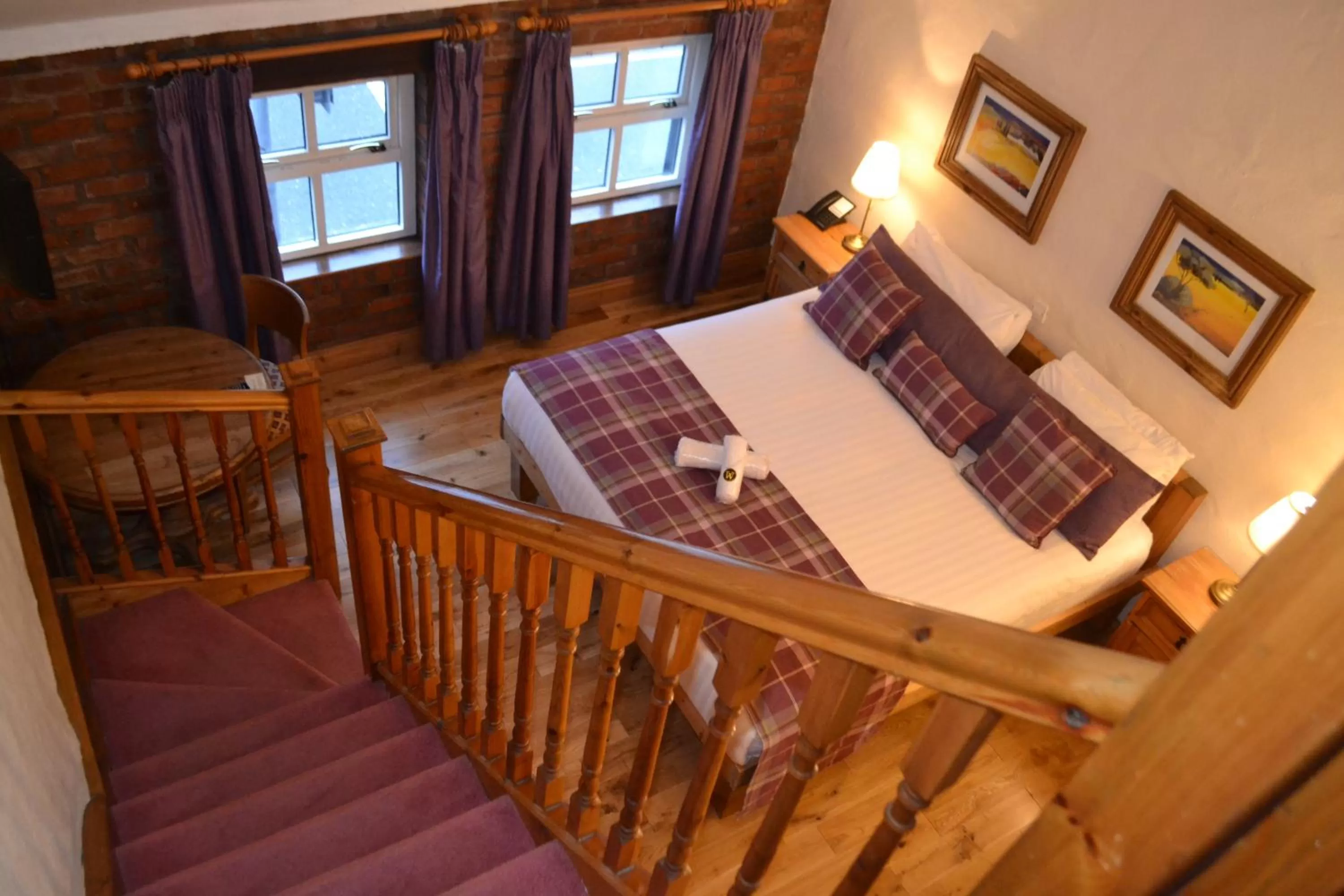 Bed in Walsh's Hotel and Apartments