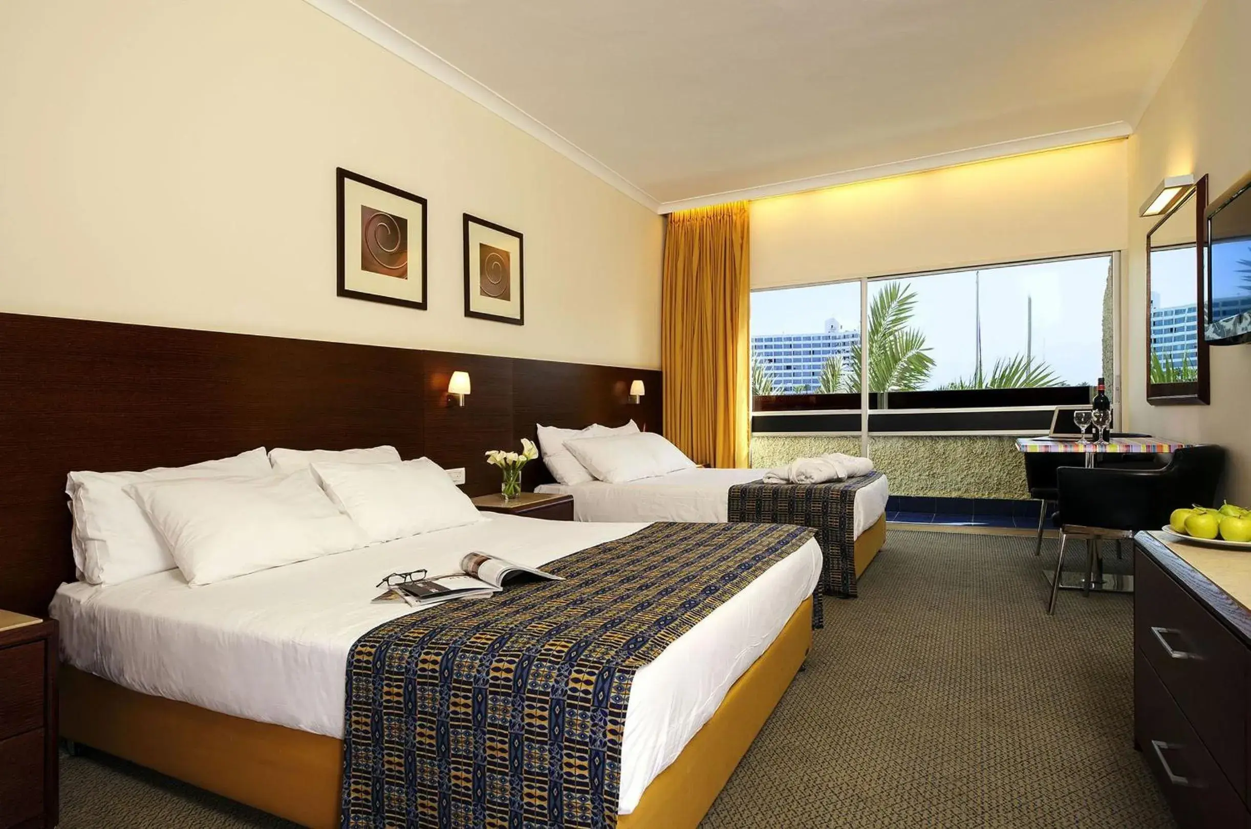 Bed in Caesar Premier Eilat Hotel