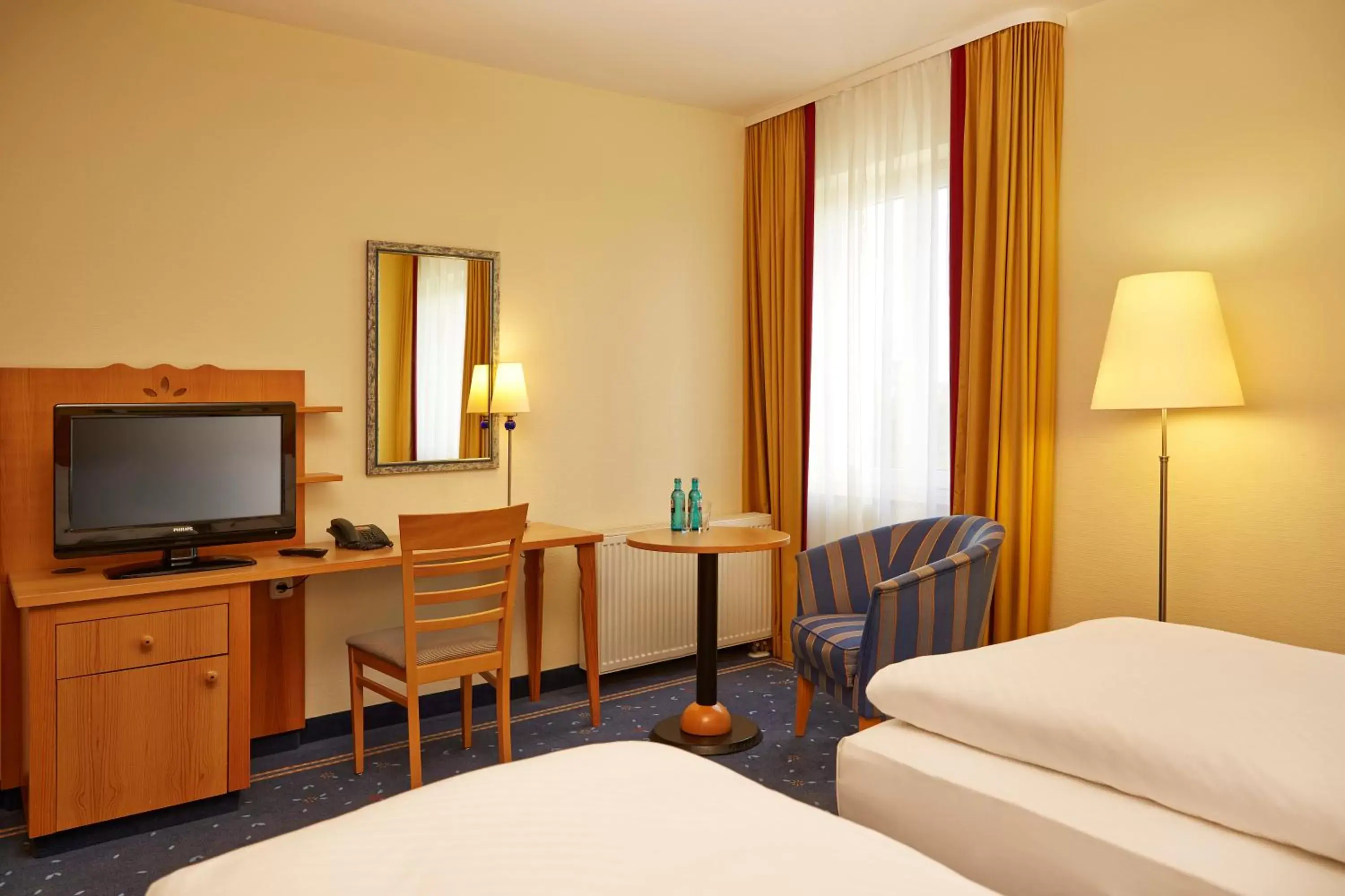 Bedroom, Bed in H+ Hotel & SPA Friedrichroda