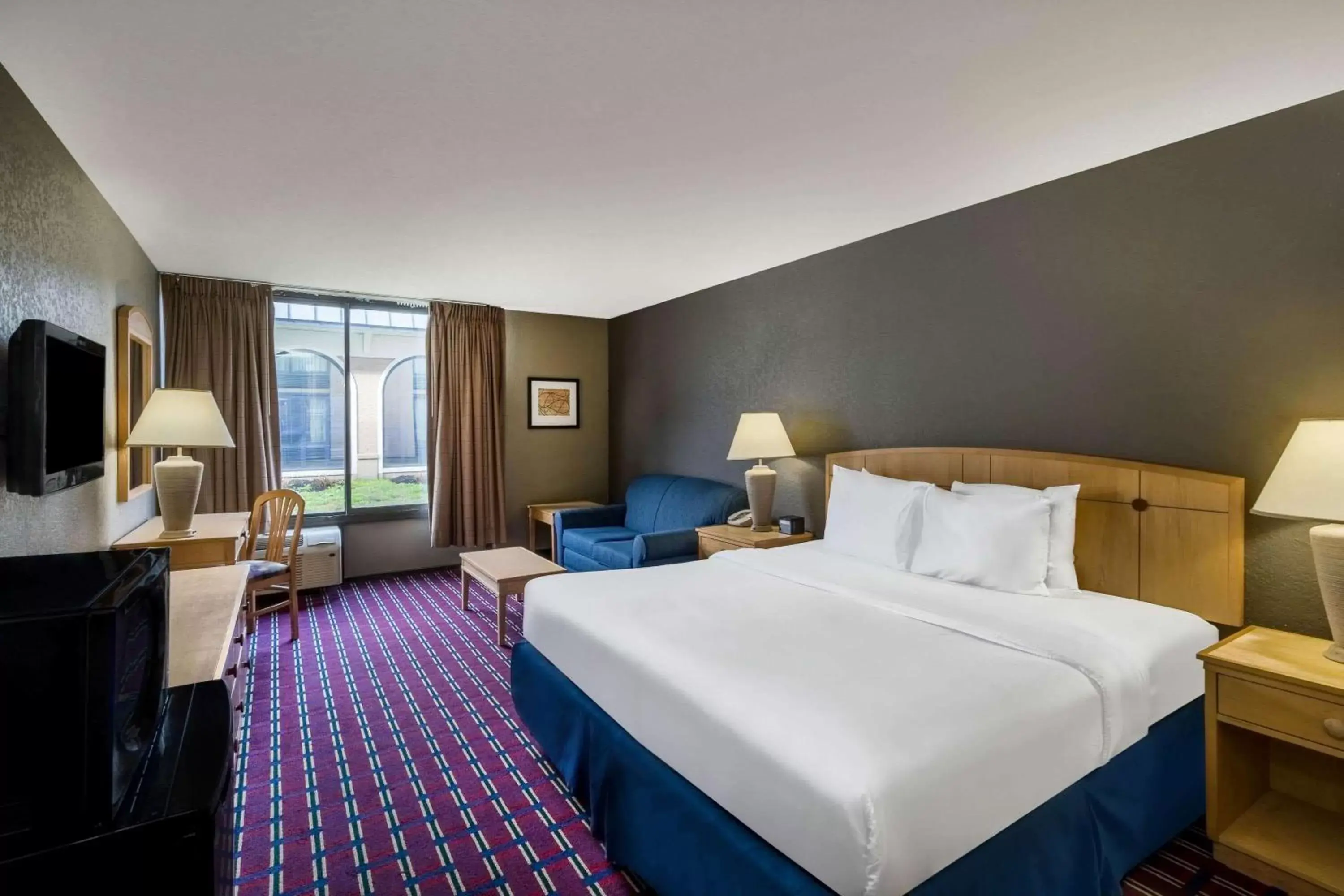 Photo of the whole room in Travelodge by Wyndham Memphis Airport/Graceland