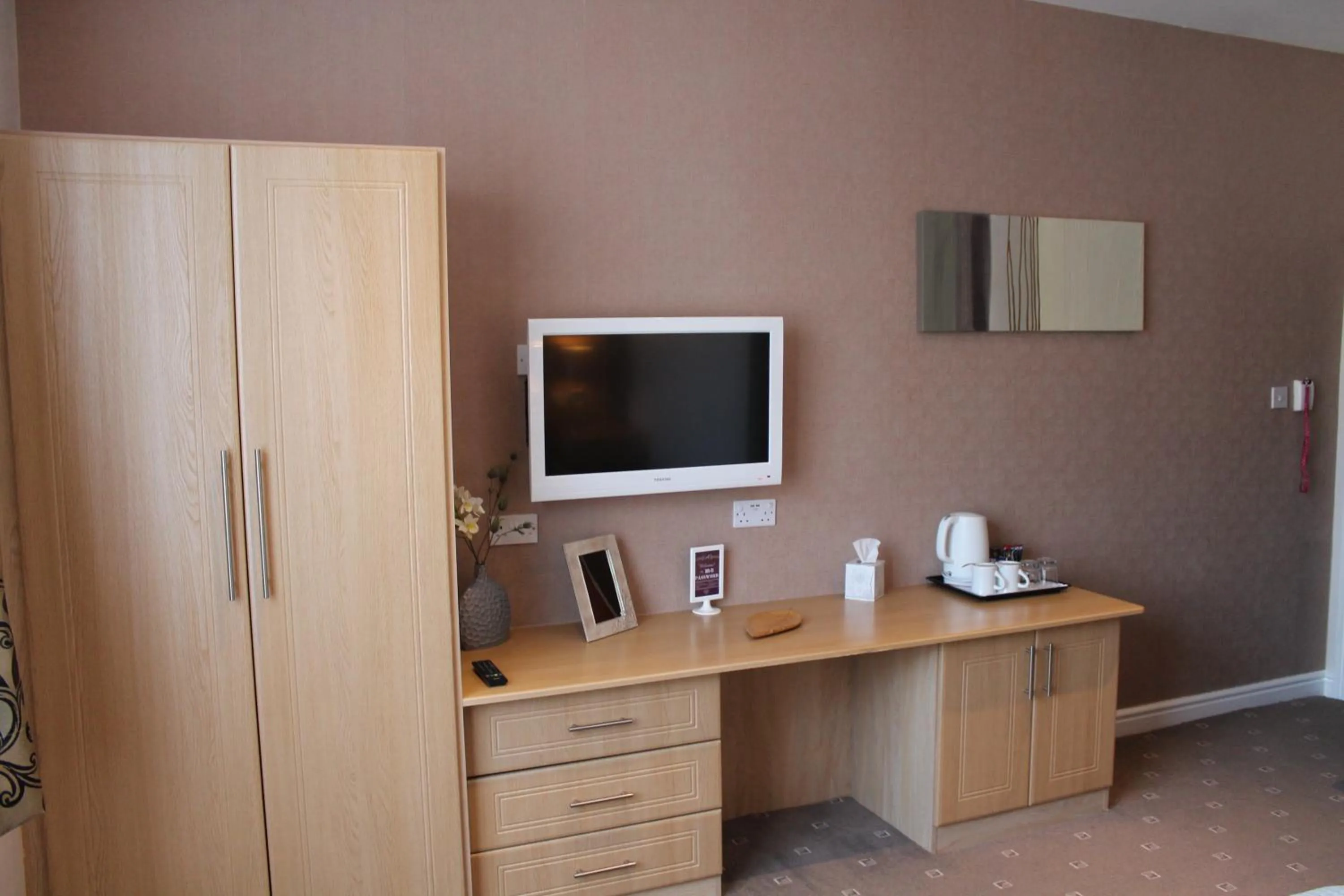 Bedroom in The Abbey House Hotel