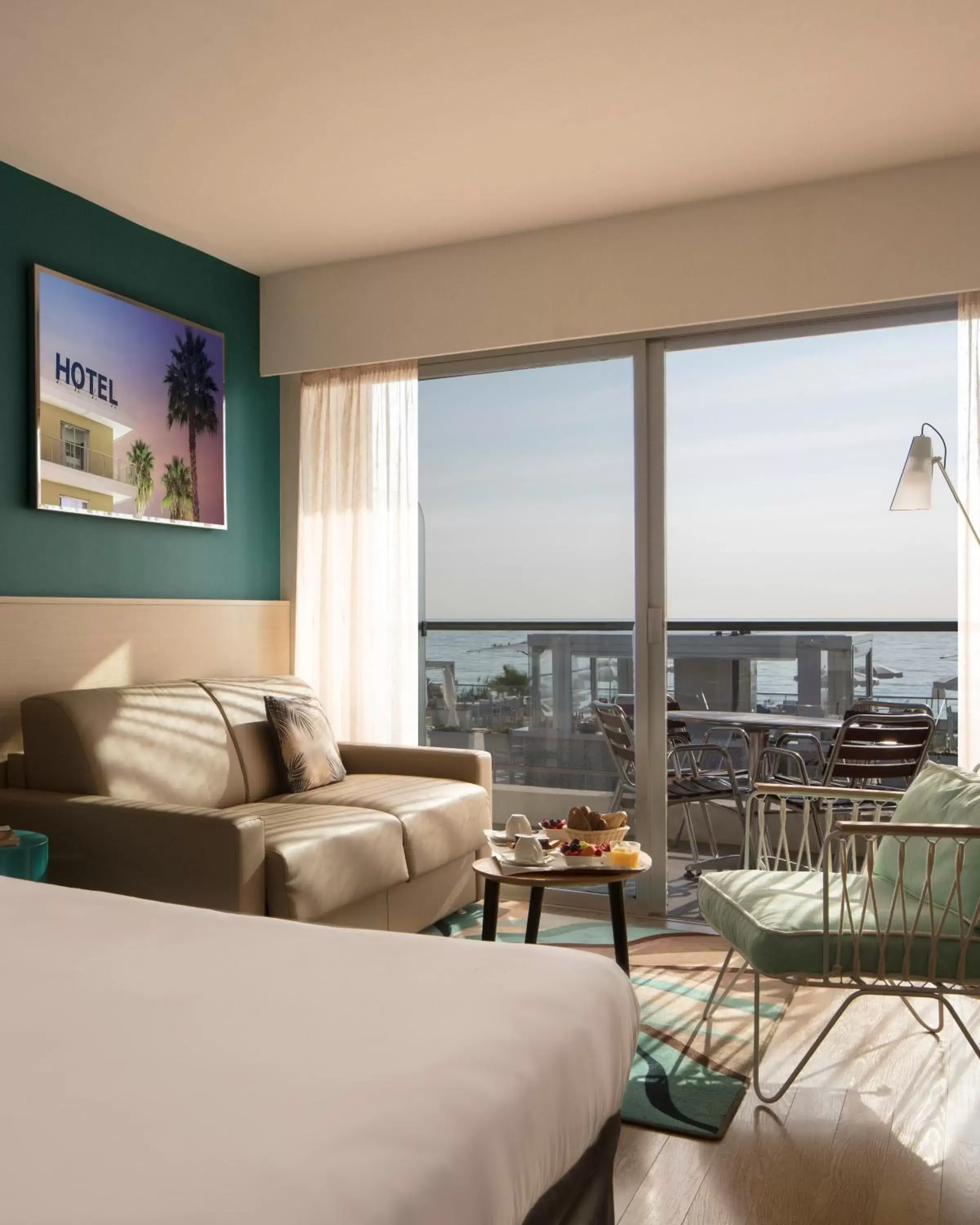 Seating area, Bed in Mercure Villeneuve Loubet Plage Seating area, Bed in Mercure Villeneuve Loubet Plage