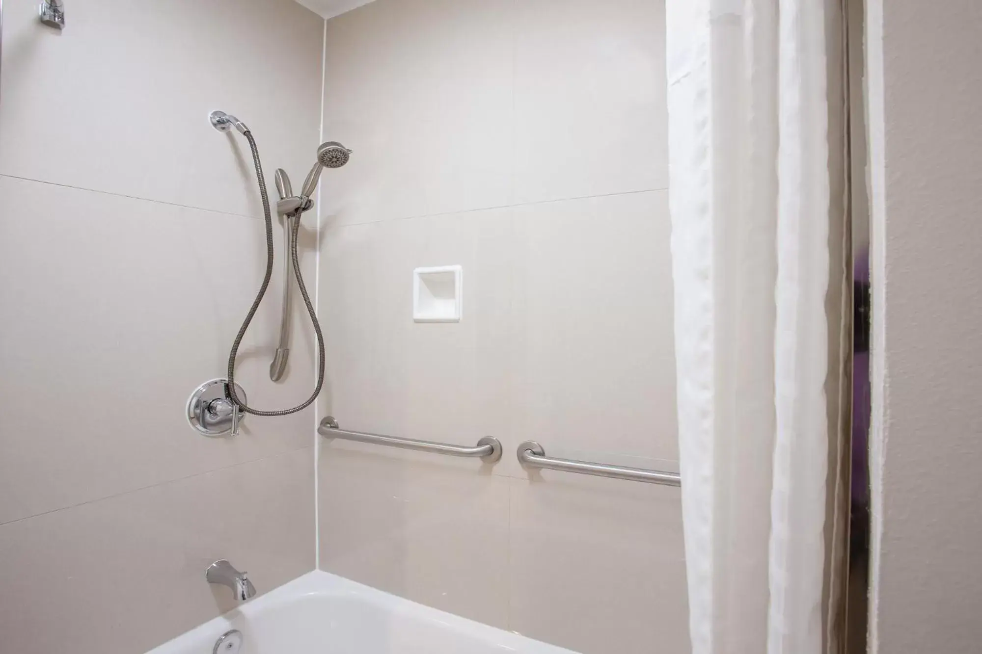 Bathroom in Travelodge Inn & Suites by Wyndham Anaheim on Disneyland Dr