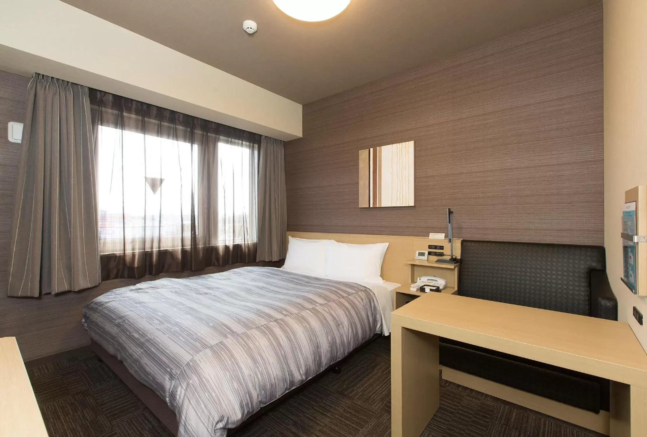 Bed in Hotel Route-Inn Koka Minakuchi