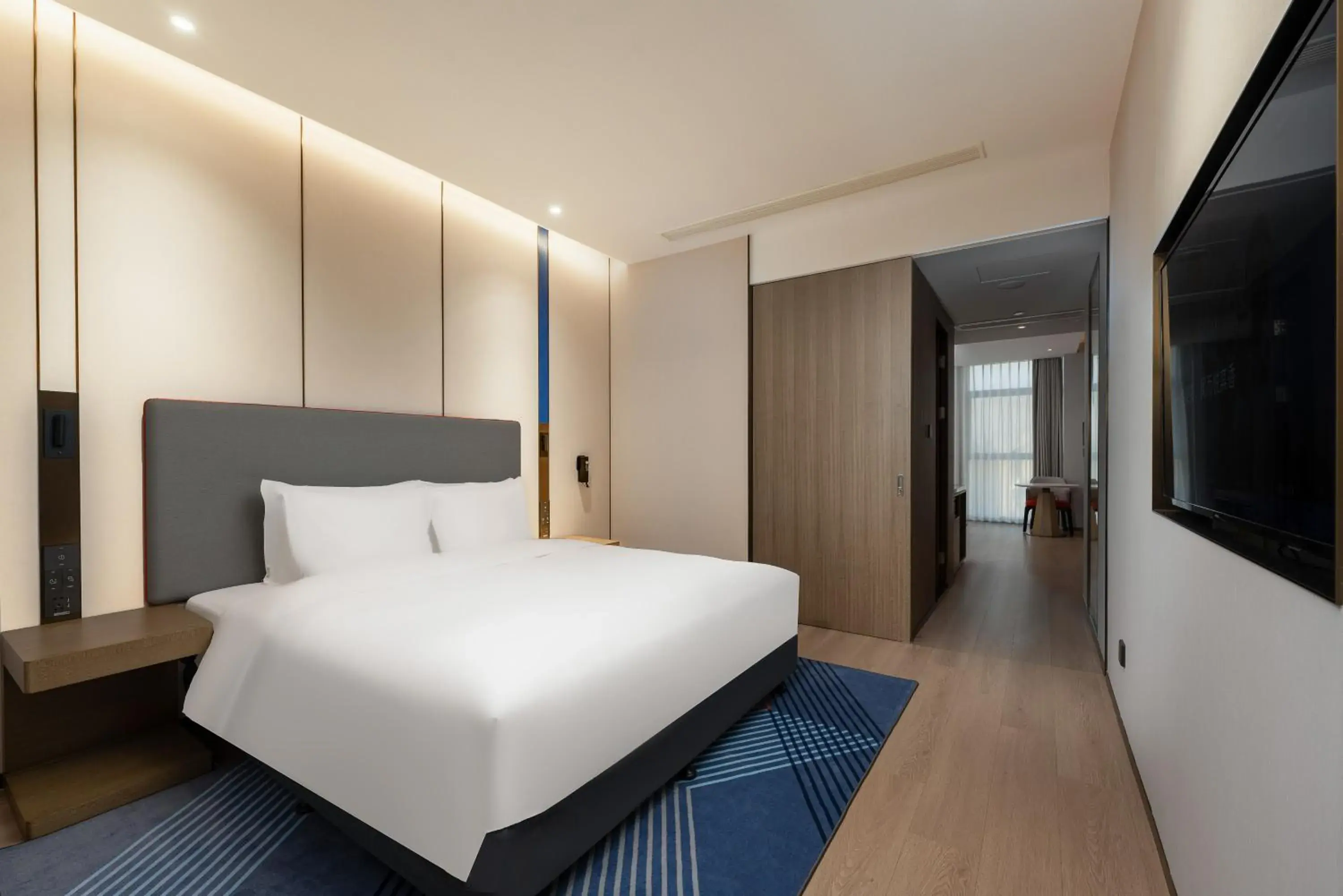 Bed in Holiday Inn Express Suzhou Bay, an IHG Hotel