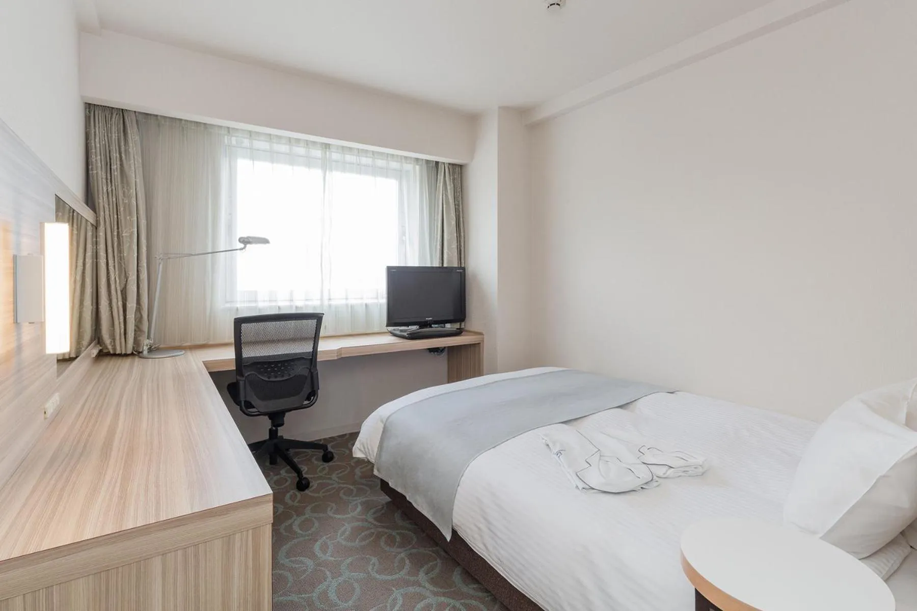 Photo of the whole room, Bed in Kusatsu Estopia Hotel