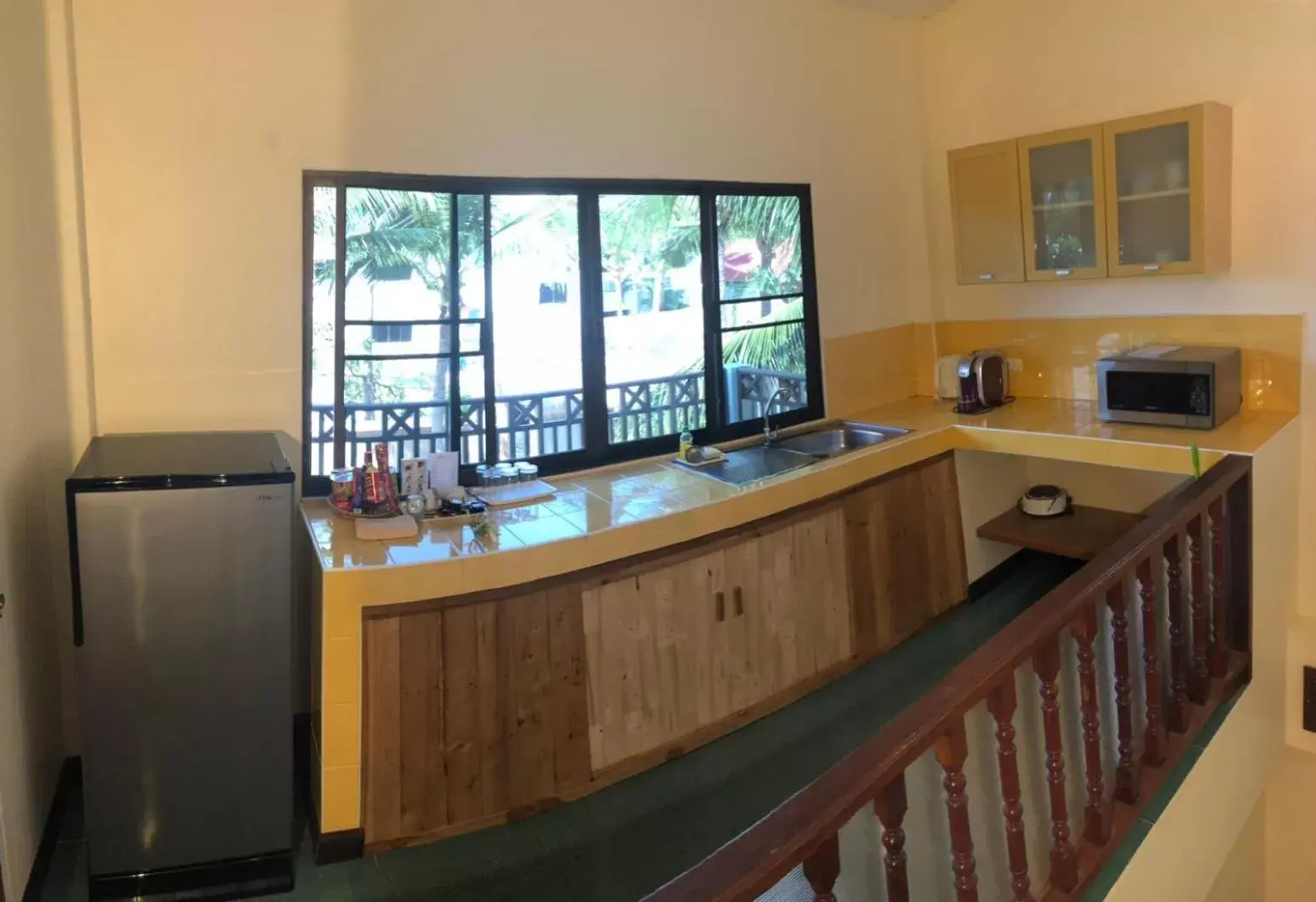 Kitchen or kitchenette, Kitchen/Kitchenette in Dolphin Bay Beach Resort