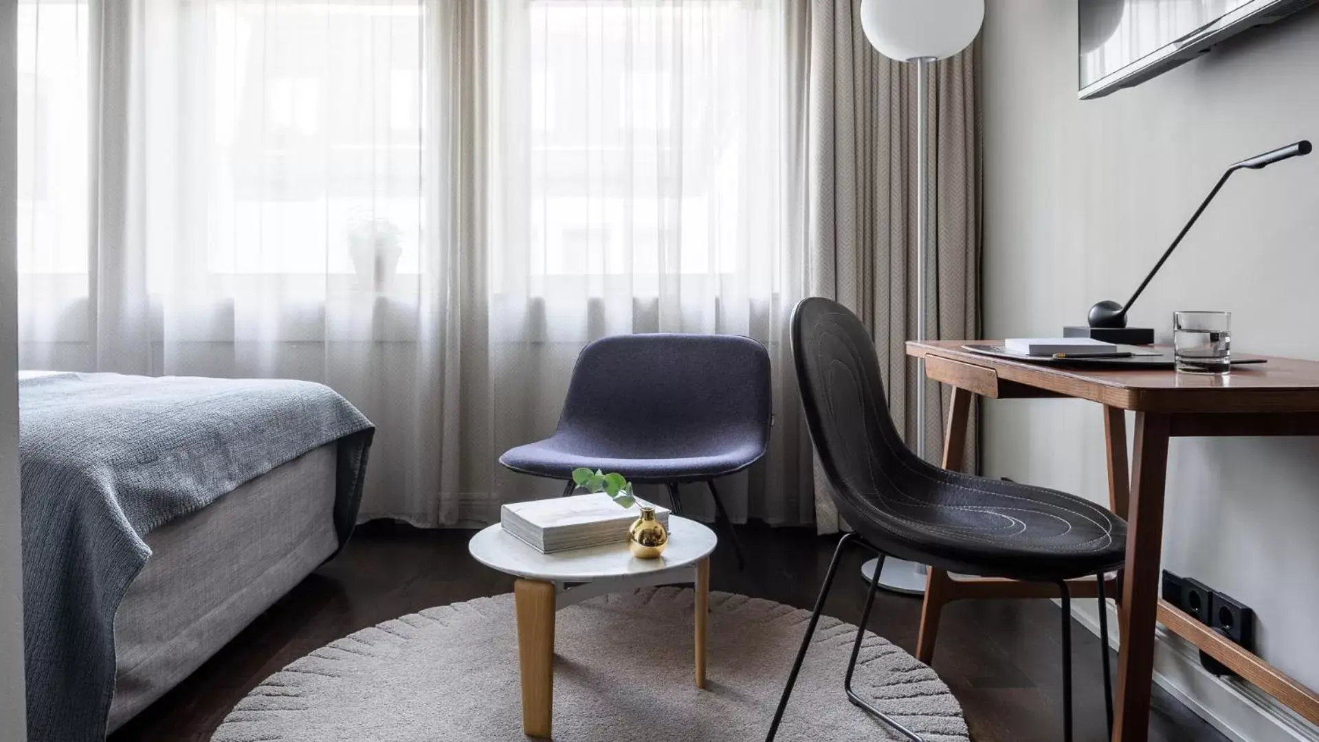 Bed, Seating Area in Nobis Hotel Stockholm, a Member of Design Hotels™