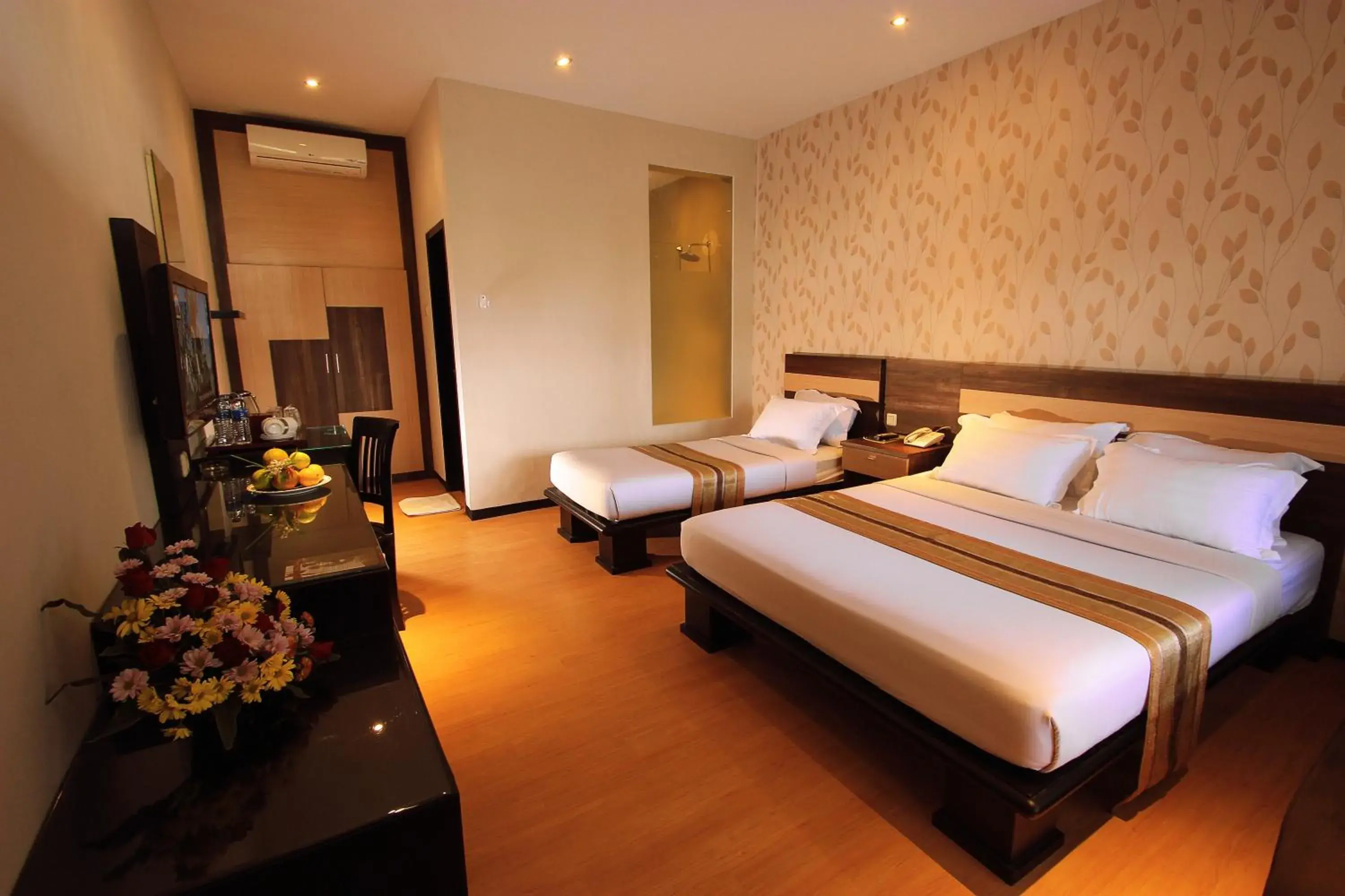Bed in Kusuma Agrowisata Resort & Convention