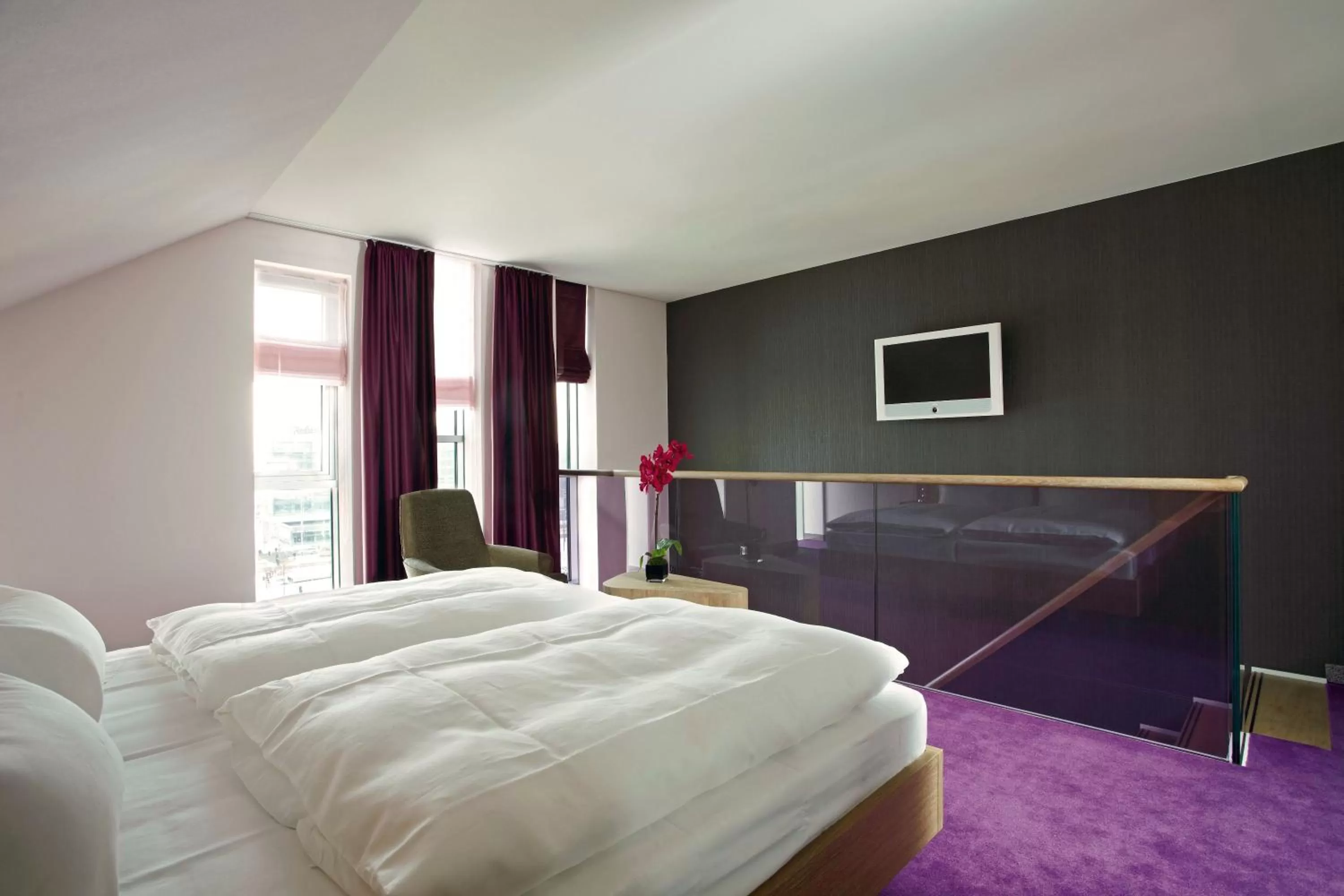 Photo of the whole room, Bed in abito Suites