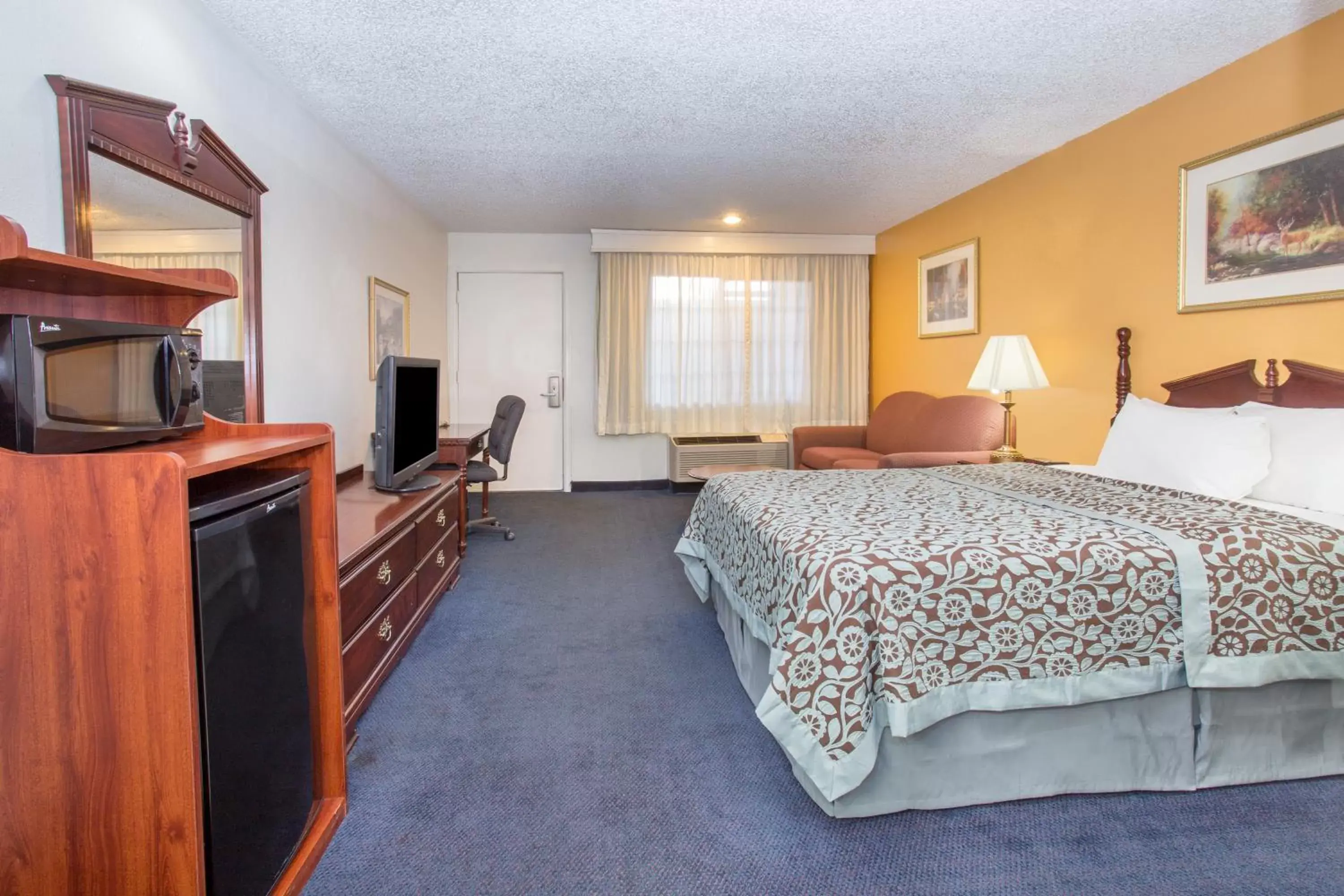 Photo of the whole room, TV/Entertainment Center in Days Inn by Wyndham Grand Junction