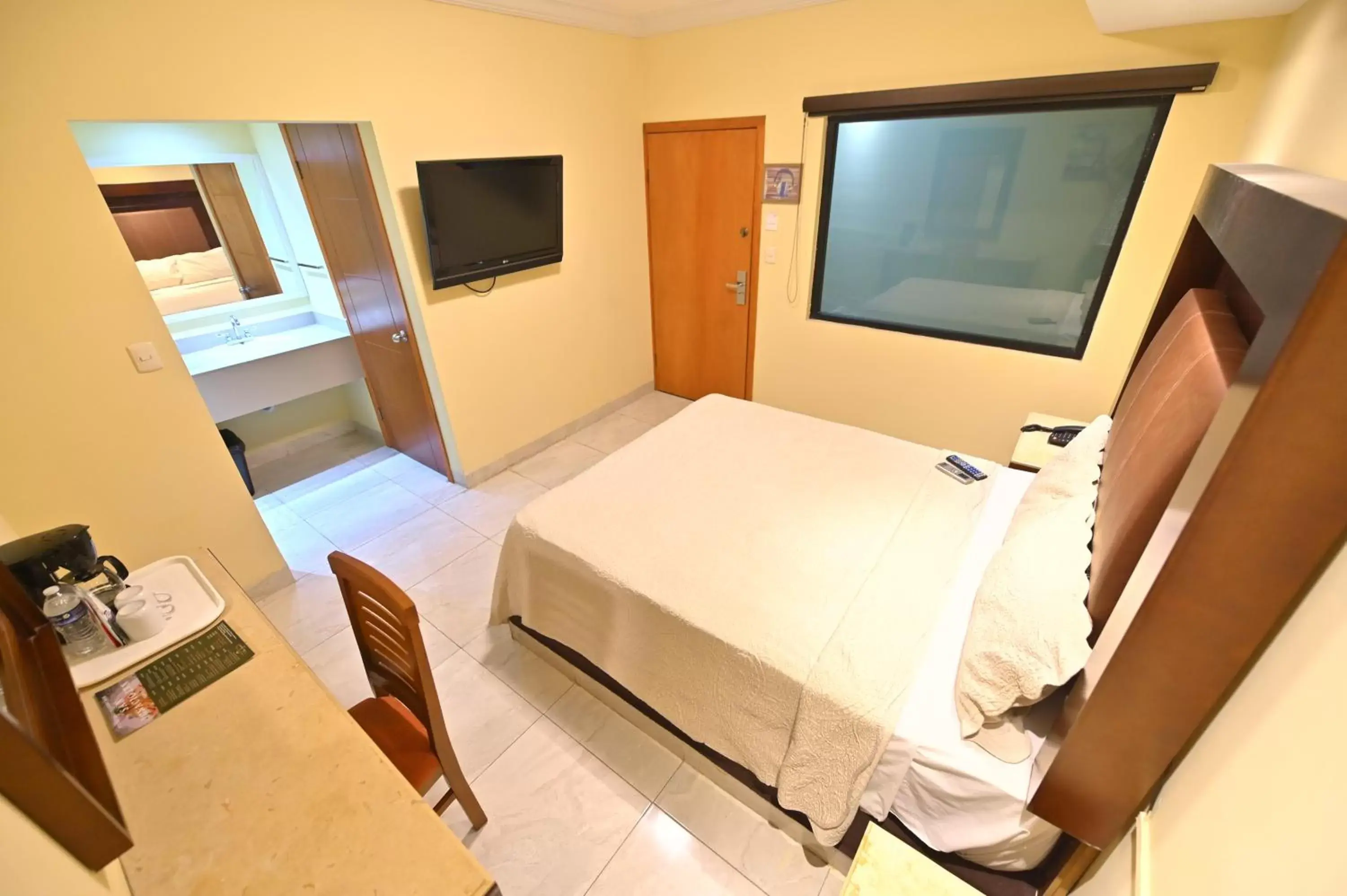 Bed in Hotel San Ignacio Inn