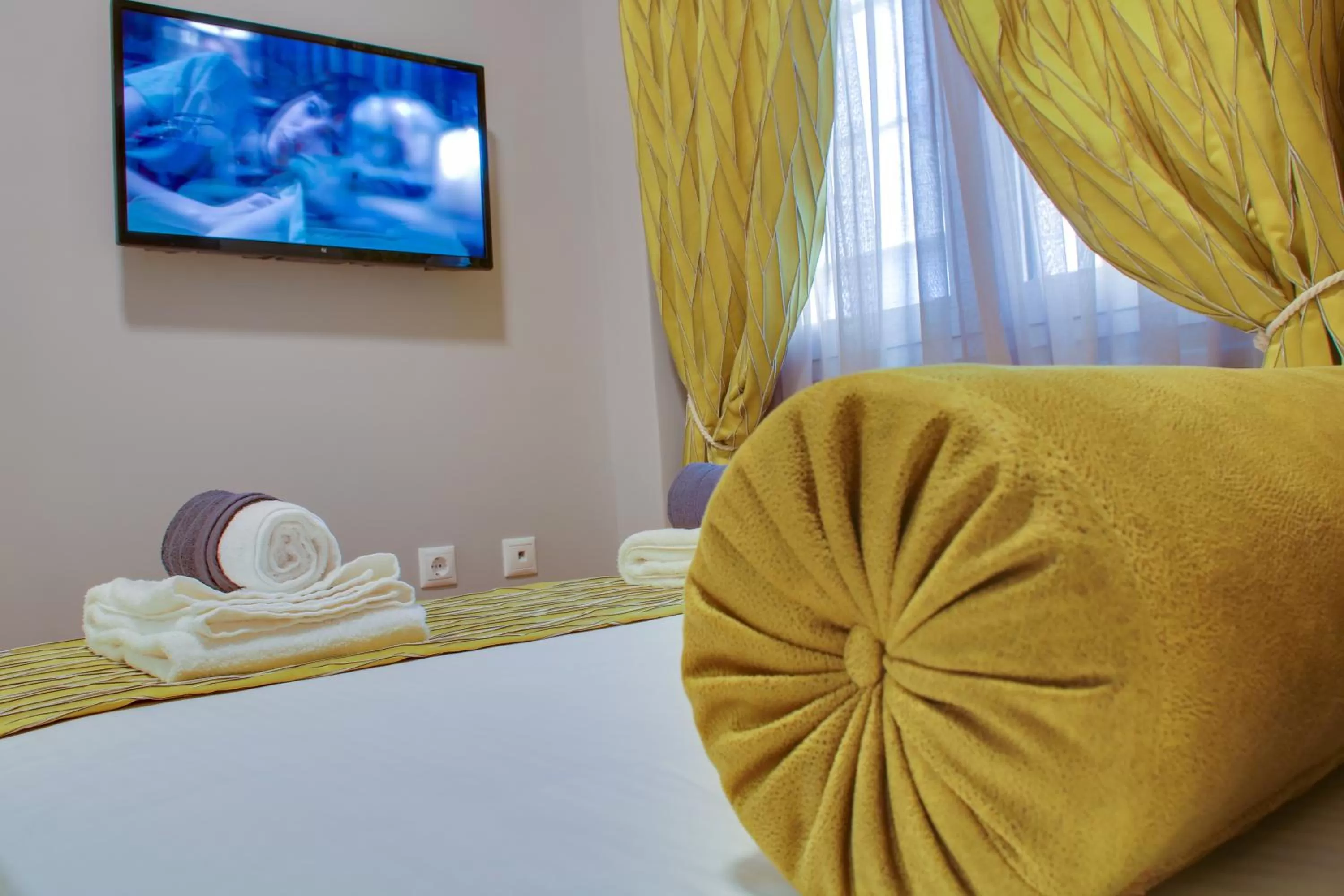 Bed in AthINN Residence