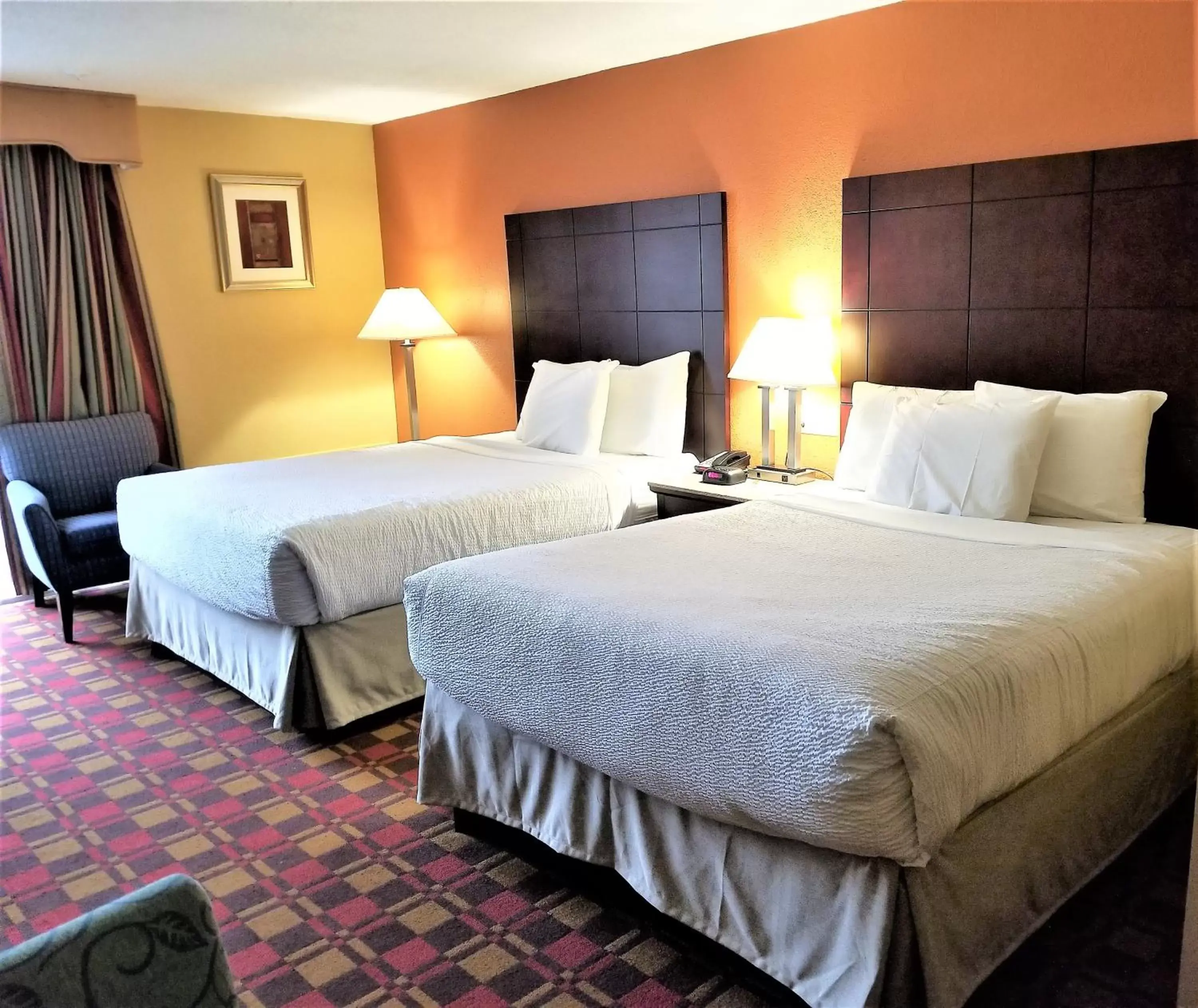 Bed in Howard Johnson by Wyndham Clifton NJ