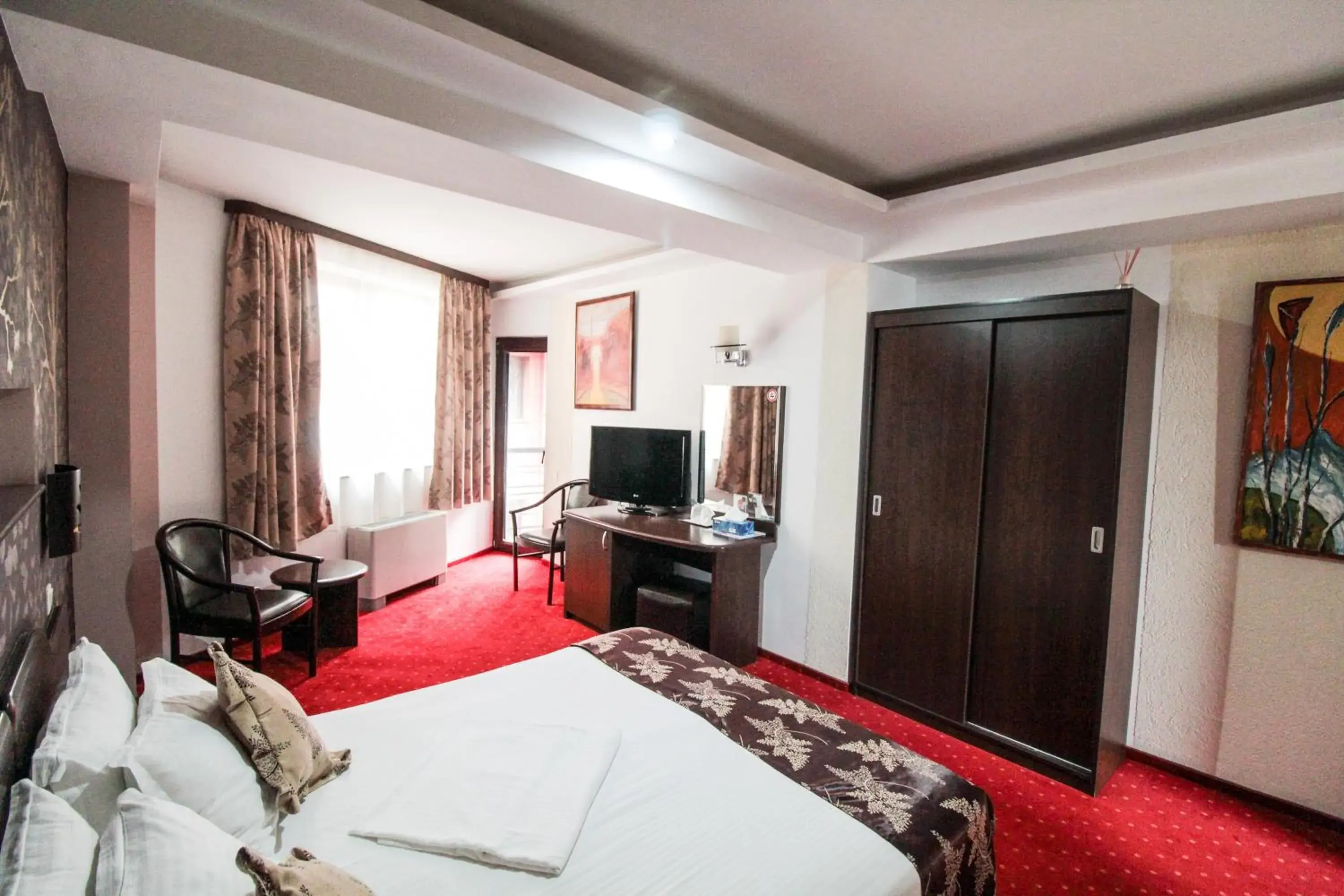 Photo of the whole room, TV/Entertainment Center in Hotel Razvan