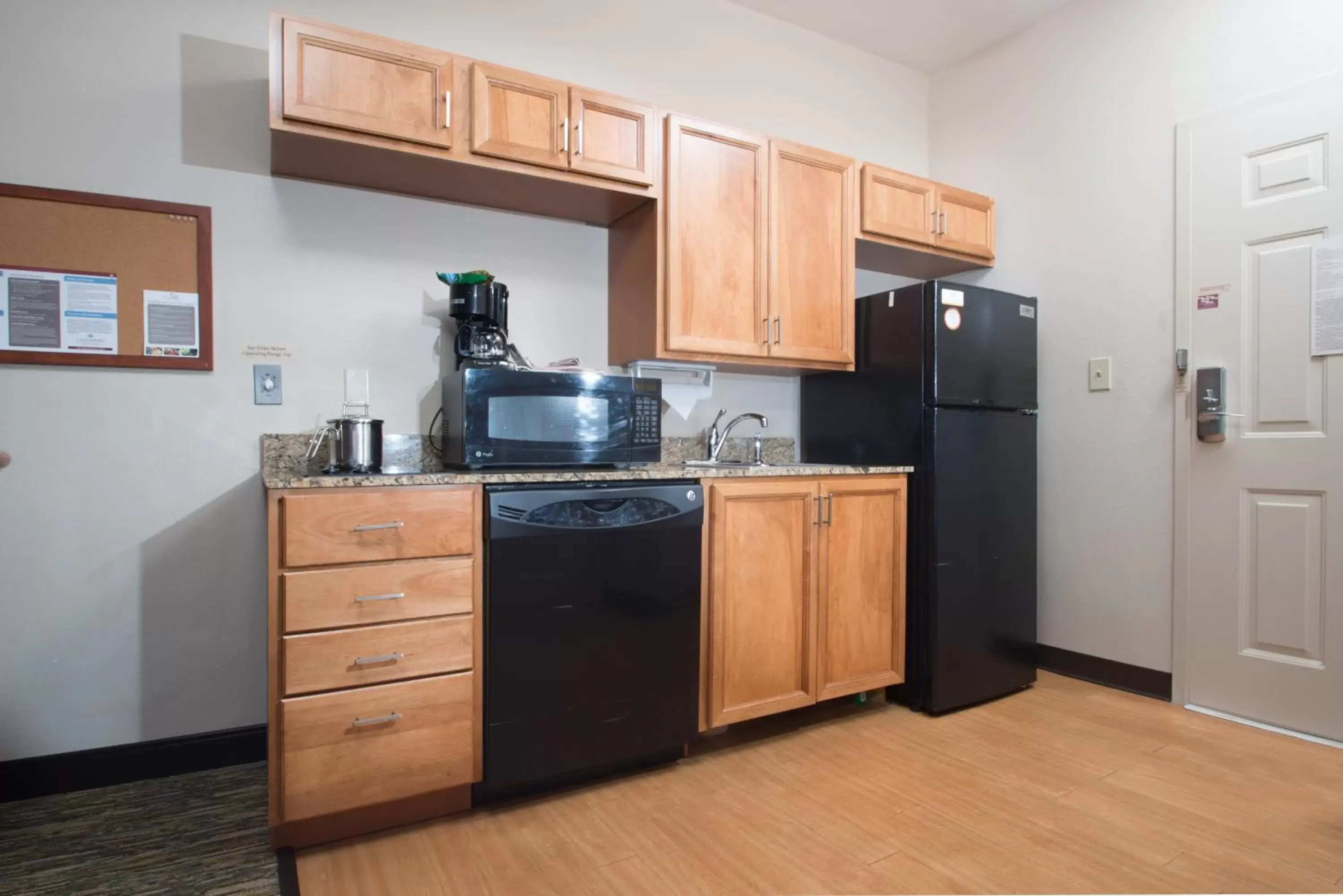 Photo of the whole room, Kitchen/Kitchenette in Candlewood Suites Wake Forest-Raleigh Area, an IHG Hotel