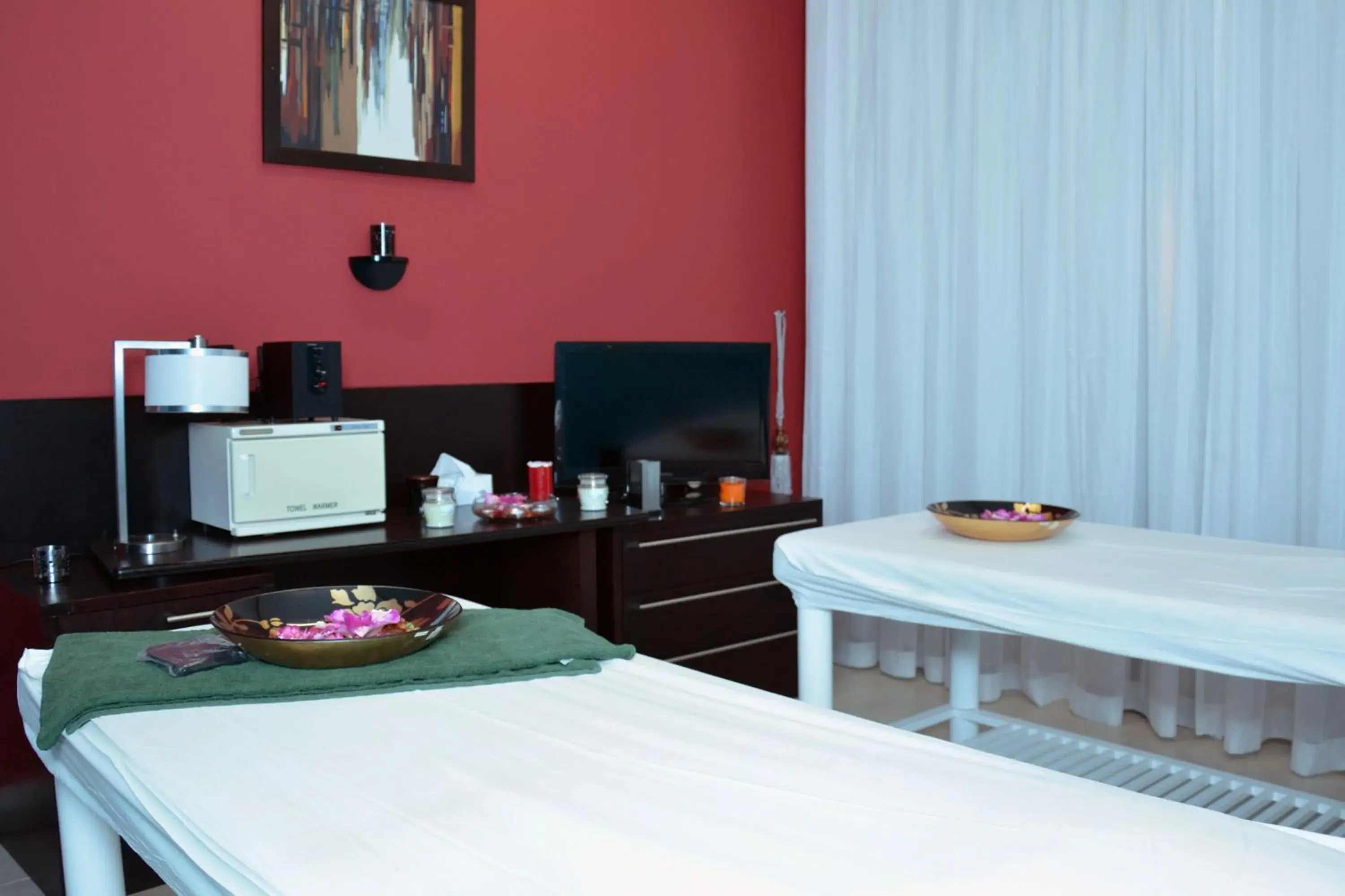 Massage, TV/Entertainment Center in The Royal Riviera Hotel Doha