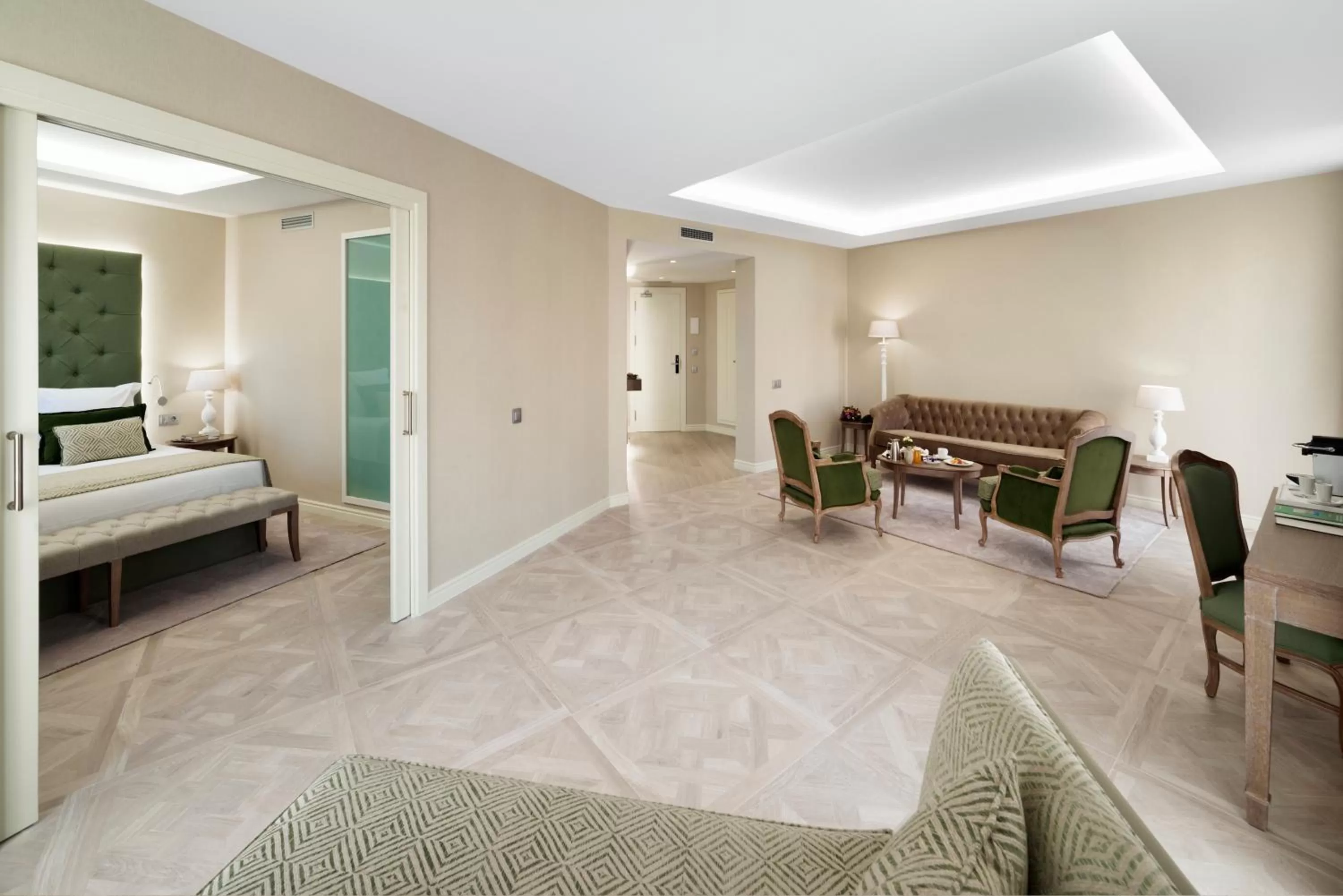 Living room, Bed in Lamaro Hotel