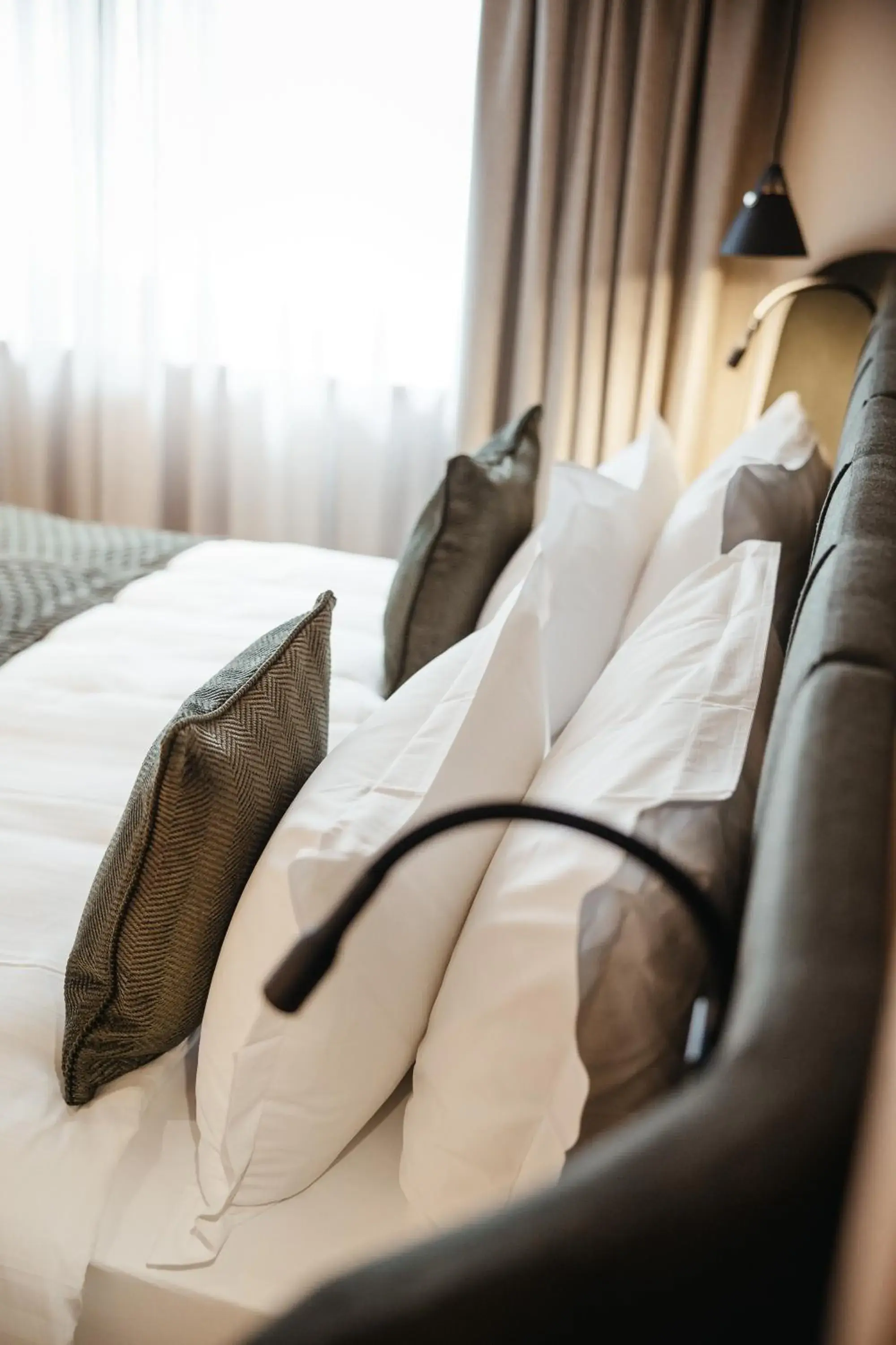 Bed, Seating Area in Kolfuschgerhof Mountain Resort