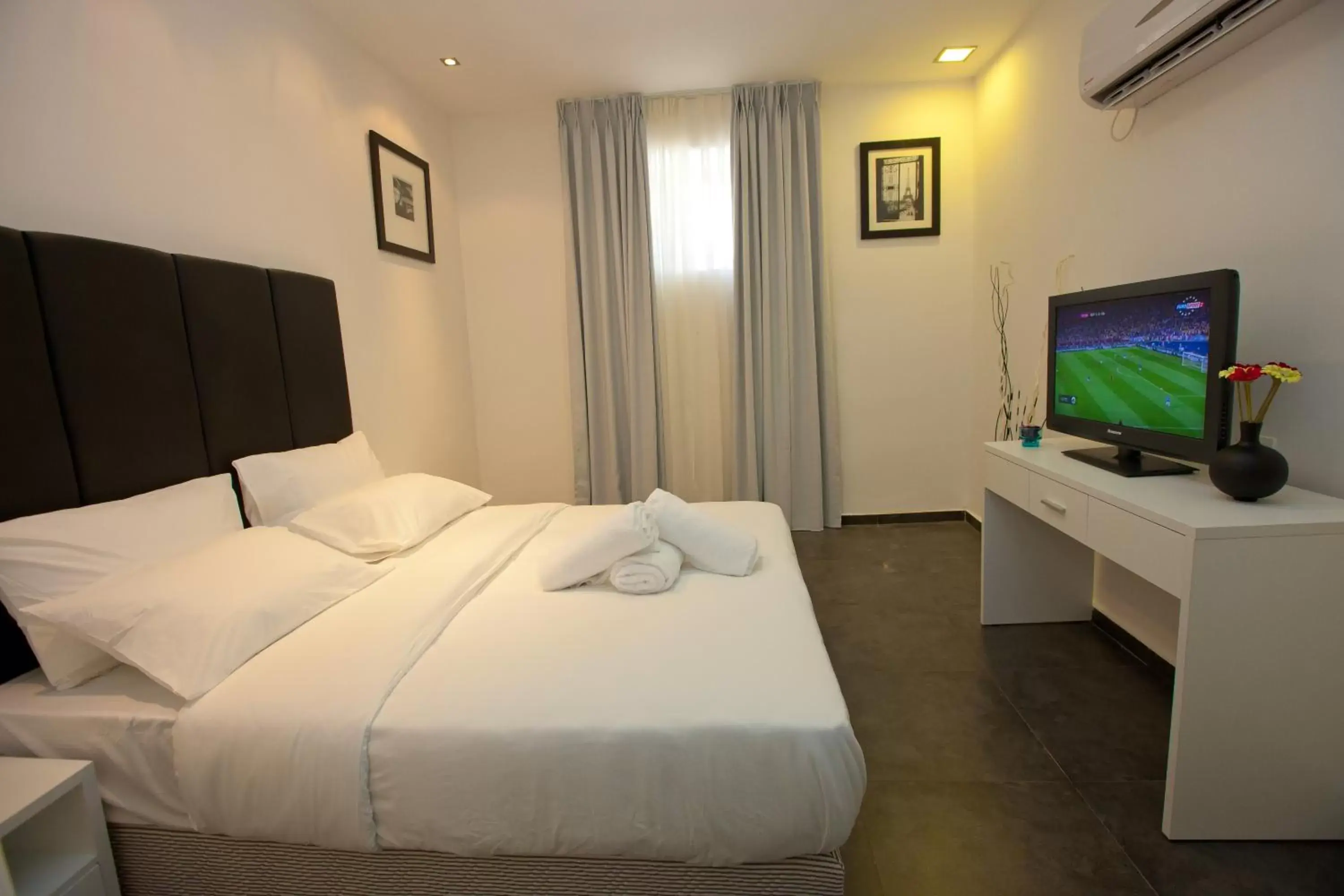 Bed in Geula Suites